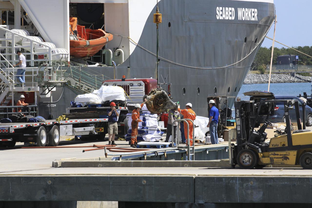 CAPE CANAVERAL, Fla. – Components for two of the F-1 engines that powered the first stage of the Saturn V rockets that lifted NASA's Apollo missions to the moon were recovered from the Atlantic Ocean March 21 by Jeff Bezos, the founder and Chief Executive Officer of the aerospace company Blue Origin and Amazon.com and arrived at Port Canaveral March 22. The engines will be restored by Bezos' team for public display. The engines were found some 14,000 feet underwater where they came to rest more than 40 years ago after sending astronauts into space on missions to the moon. Restoration may reveal exactly which engines were recovered, but Bezos said in a statement that the serial numbers were not immediately visible. Photo credit: NASA_Kim Shiflett