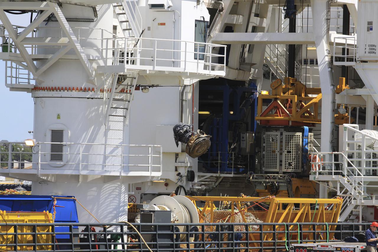 CAPE CANAVERAL, Fla. – Components for two of the F-1 engines that powered the first stage of the Saturn V rockets that lifted NASA's Apollo missions to the moon were recovered from the Atlantic Ocean March 21 by Jeff Bezos, the founder and Chief Executive Officer of the aerospace company Blue Origin and Amazon.com and arrived at Port Canaveral March 22. The engines will be restored by Bezos' team for public display. The engines were found some 14,000 feet underwater where they came to rest more than 40 years ago after sending astronauts into space on missions to the moon. Restoration may reveal exactly which engines were recovered, but Bezos said in a statement that the serial numbers were not immediately visible. Photo credit: NASA_Kim Shiflett