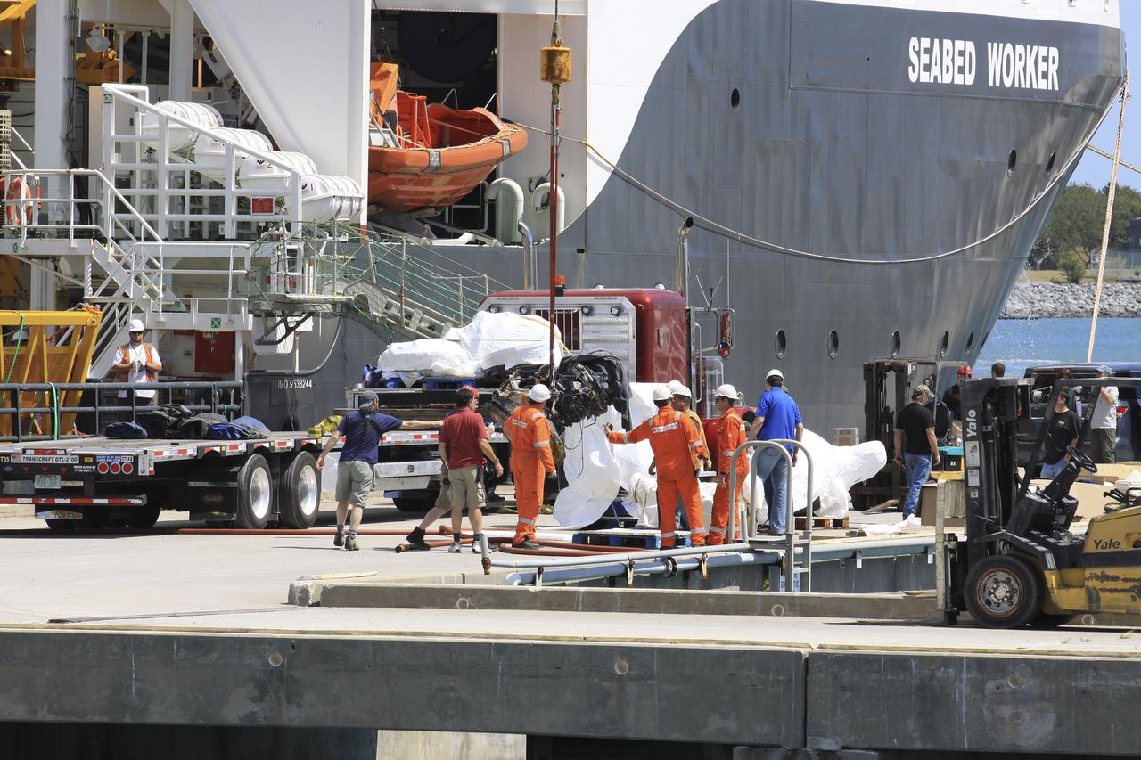 CAPE CANAVERAL, Fla. – Components for two of the F-1 engines that powered the first stage of the Saturn V rockets that lifted NASA's Apollo missions to the moon were recovered from the Atlantic Ocean March 21 by Jeff Bezos, the founder and Chief Executive Officer of the aerospace company Blue Origin and Amazon.com and arrived at Port Canaveral March 22. The engines will be restored by Bezos' team for public display. The engines were found some 14,000 feet underwater where they came to rest more than 40 years ago after sending astronauts into space on missions to the moon. Restoration may reveal exactly which engines were recovered, but Bezos said in a statement that the serial numbers were not immediately visible. Photo credit: NASA_Kim Shiflett