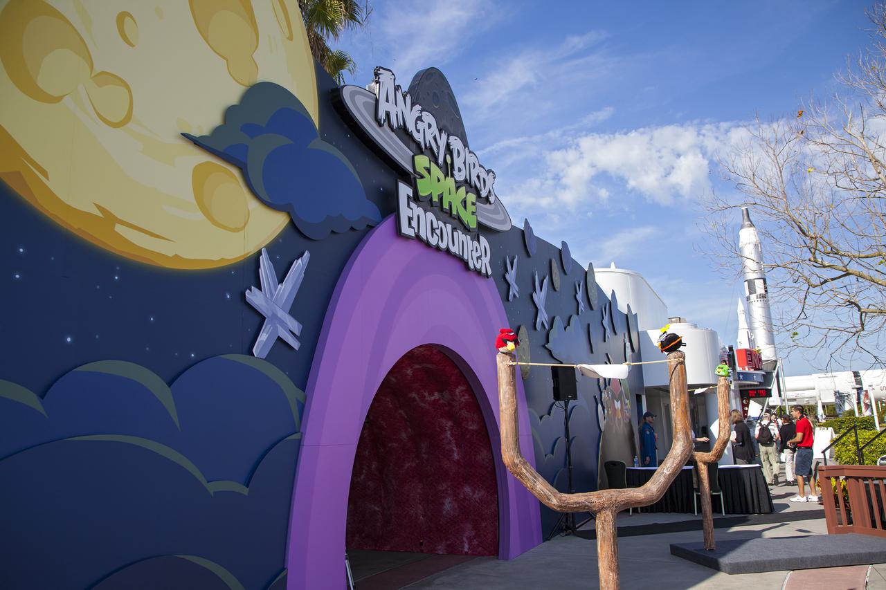 CAPE CANAVERAL, Fla. -- At NASA’s Kennedy Space Center Visitor Complex in Florida, the entrance to the new Angry Birds Space Encounter is seen before the grand opening celebration begins.  Finland-based Rovio Entertainment, the creator of the Angry Birds Space game, partnered with Kennedy Space Center to bring the beloved characters to life. It is the first Angry Birds interactive exhibit in the United States designed for people of all ages. The 4,485-square-foot facility hosts the space adventures of the Angry Birds as they travel into an intergalactic wormhole, come face-to-face with Space Pigs and discover heroic superpowers. Six interactive stations are designed to encourage children in science, technology, engineering and mathematics fields of study. Photo credit: NASA_Kim Shiflett