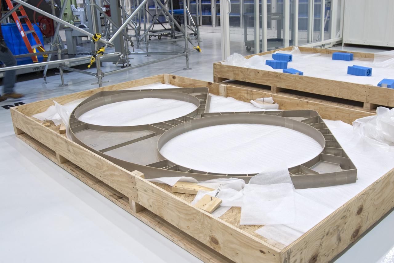 CAPE CANAVERAL, Fla. – Inside the Operations and Checkout Building high bay at NASA’s Kennedy Space Center in Florida, a bulkhead is being prepared for installation on the Orion service module for Exploration Flight Test 1, or EFT-1. Orion is the exploration spacecraft designed to carry crews to space beyond low Earth orbit. It will provide emergency abort capability, sustain the crew during the space travel and provide safe re-entry from deep space return velocities. Orion’s first unpiloted test flight is scheduled to launch in 2014 atop a United Launch Alliance Delta IV heavy rocket. A second uncrewed flight test is scheduled for 2017 on the Space Launch System rocket. For more information, visit http:__www.nasa.gov_orion. Photo credit: NASA_Charisse Nahser