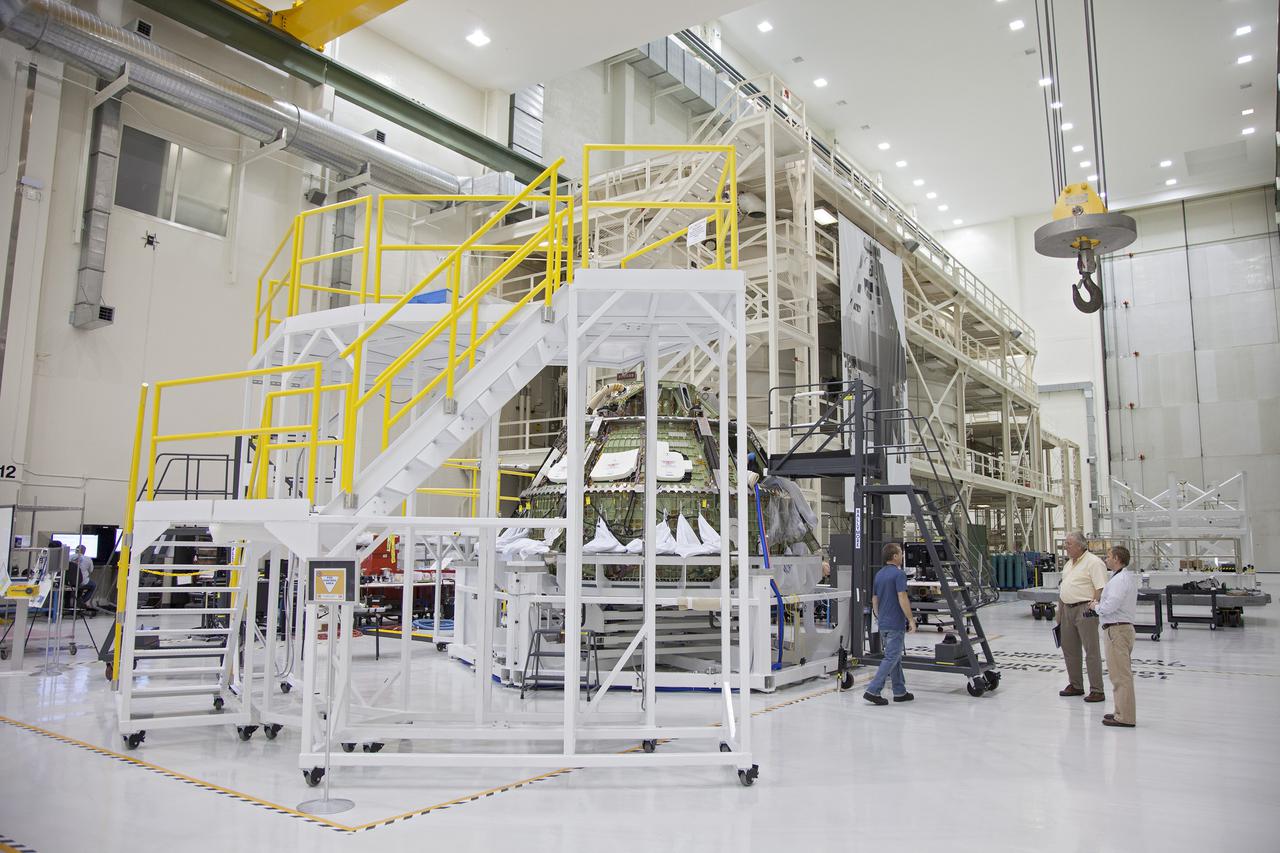 CAPE CANAVERAL, Fla. -- Inside the Operations and Checkout Building high bay at NASA’s Kennedy Space Center in Florida, preparations are underway to lift the Orion crew module from its processing stand and transfer it onto a dolly. Orion is being prepared for Exploration Flight Test 1, or EFT-1. Orion is the exploration spacecraft designed to carry crews to space beyond low Earth orbit. It will provide emergency abort capability, sustain the crew during the space travel and provide safe re-entry from deep space return velocities. Orion’s first unpiloted test flight is scheduled to launch in 2014 atop a United Launch Alliance Delta IV heavy rocket. A second uncrewed flight test is scheduled for 2017 on the Space Launch System rocket. For more information, visit http:__www.nasa.gov_orion. Photo credit: NASA_Frankie Martin