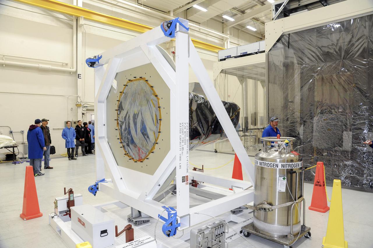 VANDENBERG AFB, Calif. – Technicians begin processing NASA's IRIS spacecraft at Vandenberg where the spacecraft will be readied for launch aboard an Orbital Sciences Pegasus XL rocket. IRIS is short for Interface Region Imaging Spectrograph and the spacecraft's mission will improve our understanding of how heat and energy move through the deepest levels of the sun’s atmosphere, thereby increasing our ability to forecast space weather. Photo credit: VAFB_Tony Vauelin