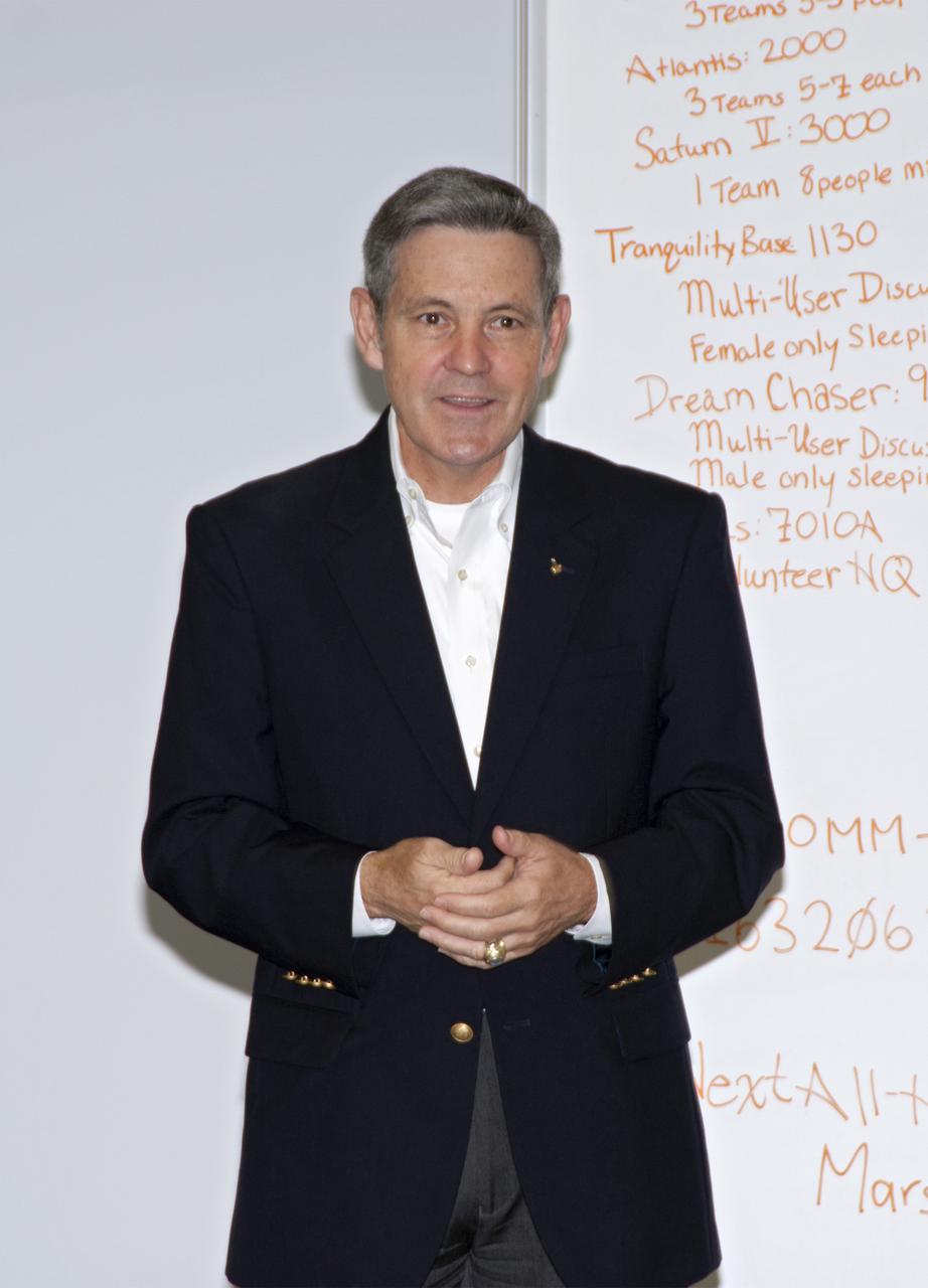 CAPE CANAVERAL, Fla. – Kennedy Space Center Director Bob Cabana speaks with participants of the 2013 International Space Apps Challenge, or ISAC, at The Astronaut Memorial Foundation’s Center for Space Education in Florida during a networking event. During the worldwide two-day challenge, more than 9,000 people and 484 organizations came together in 83 cities across 44 countries, as well as online, to develop new ways of solving challenges that NASA faces. At Kennedy, four teams brainstormed ideas with subject matter experts and others and worked nearly 32 hours straight to present their concepts to a panel of three technical and non-technical judges. Challenges tackled at Kennedy were: Deployable Greenhouse, Kennedy Space Center 2040, Seven Minutes of Science, and Moonville – Lunar Industry Game. Photo credit: NASA_Charisse Nahser