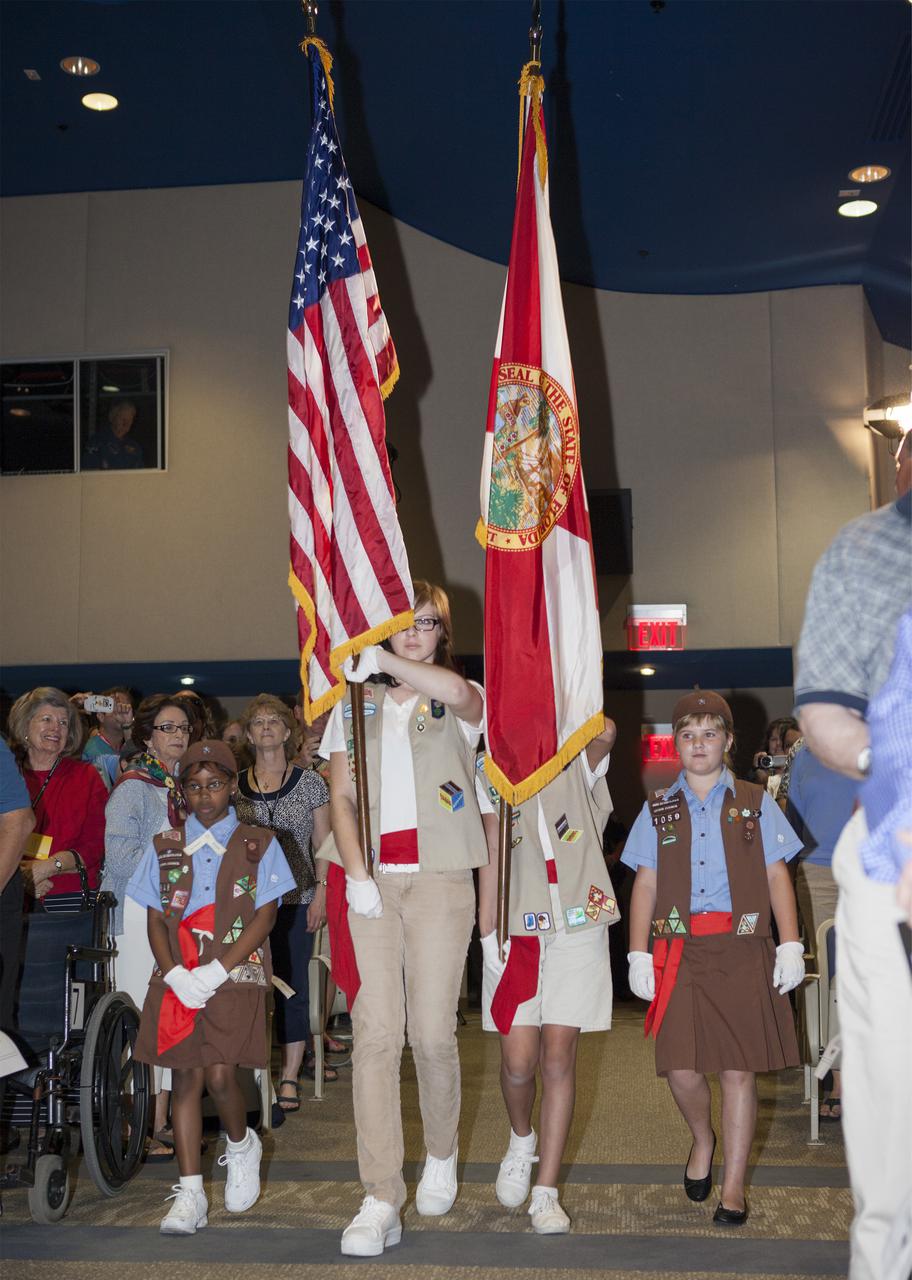 CAPE CANAVERAL, Fla. – At NASA’s Kennedy Space Center Visitor Complex in Florida, Girl Scouts from Citrus Council, representing Florida's Brevard, Orange, Seminole and Volusia Counties, presents the colors to open the U.S. Astronaut Hall of Fame 2013 induction ceremony. Space shuttle astronauts Curt Brown, Eileen Collins and Bonnie Dunbar were inducted into the U.S. Astronaut Hall of Fame. This induction is the twelfth group of space shuttle astronauts named to the AHOF, and the first time two women are inducted at the same time. The year’s inductees were selected by a committee of current Hall of Fame astronauts, former NASA officials, historians and journalists. The selection process is administered by the Astronaut Scholarship Foundation. For more on the U.S. Astronaut Hall of Fame, go to http:__www.kennedyspacecenter.com_astronaut-hall-of-fame.aspx For more on the Astronaut Scholarship Foundation, go to http:__astronautscholarship.org_ Photo credit: NASA_ Kim Shiflett