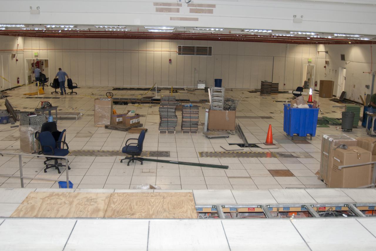 CAPE CANAVERAL, Fla. – At NASA’s Kennedy Space Center in Florida, work continues in Firing Room 2 in the Launch Control Center, or LCC. The legacy flooring is being removed and wiring and conduits below the floor will be upgraded. Firing Rooms inside the LCC are being upgraded by the Ground System Development and Operations Program at Kennedy to support the processing and launch of multiple types of rockets and spacecraft, whether they are government or commercial models. Kennedy’s Launch Complex 39 is transitioning to support multiple users with the Firing Rooms being modified to be more generic in nature for upcoming programs. Photo credit: NASA_Gary Thompson