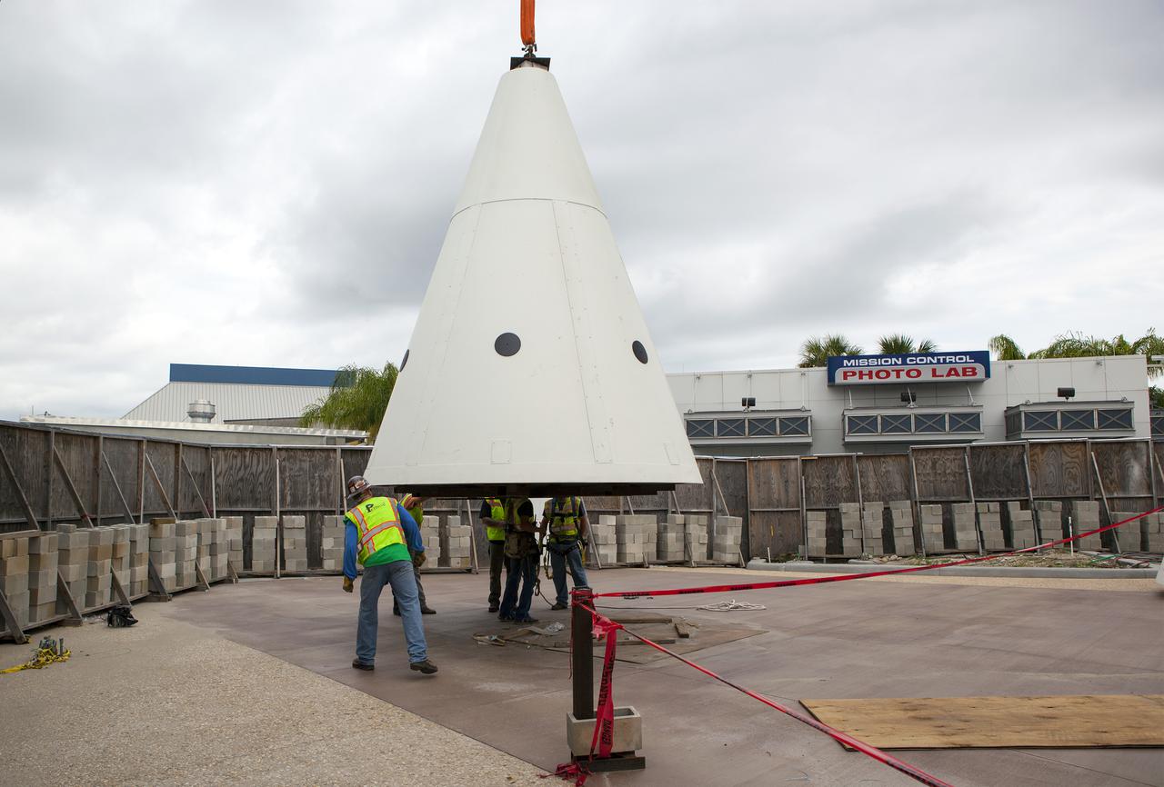 CAPE CANAVERAL, Fla. – Workers prepare to lift a nose cone to top out one of a pair of replica space shuttle solid rocket boosters at the entry of the space shuttle Atlantis attraction under construction at the Kennedy Space Center Visitor Complex. Workers will use cranes to place the nose cones atop each of the model boosters. The building at right houses the actual shuttle Atlantis. Photo credit: NASA_Dmitri Gerondidakis IRIS will open a new window of discovery by tracing the flow of energy and plasma through the chromospheres and transition region into the sun’s corona using spectrometry and imaging. IRIS fills a crucial gap in our ability to advance studies of the sun-to-Earth connection by tracing the flow of energy and plasma through the foundation of the corona and the region around the sun known as the heliosphere. Photo credit: VAFB_Randy Beaudoin
