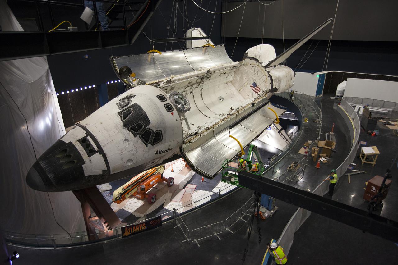 CAPE CANAVERAL, Fla. – At the Kennedy Space Center Visitor Complex in Florida, space shuttle Atlantis’ payload bay doors have been opened, revealing the payload bay. Atlantis is being prepared for display in the “Space Shuttle Atlantis” exhibit, a 90,000-square-foot facility, scheduled to open June 29, 2013.  The new $100 million facility will include interactive exhibits that tell the story of the 30-year Space Shuttle Program and highlight the future of space exploration. Visitors to the exhibit will get an up close look at Atlantis with its payload bay doors open, similar to how it looked in space. Photo credit: NASA_Kim Shiflett