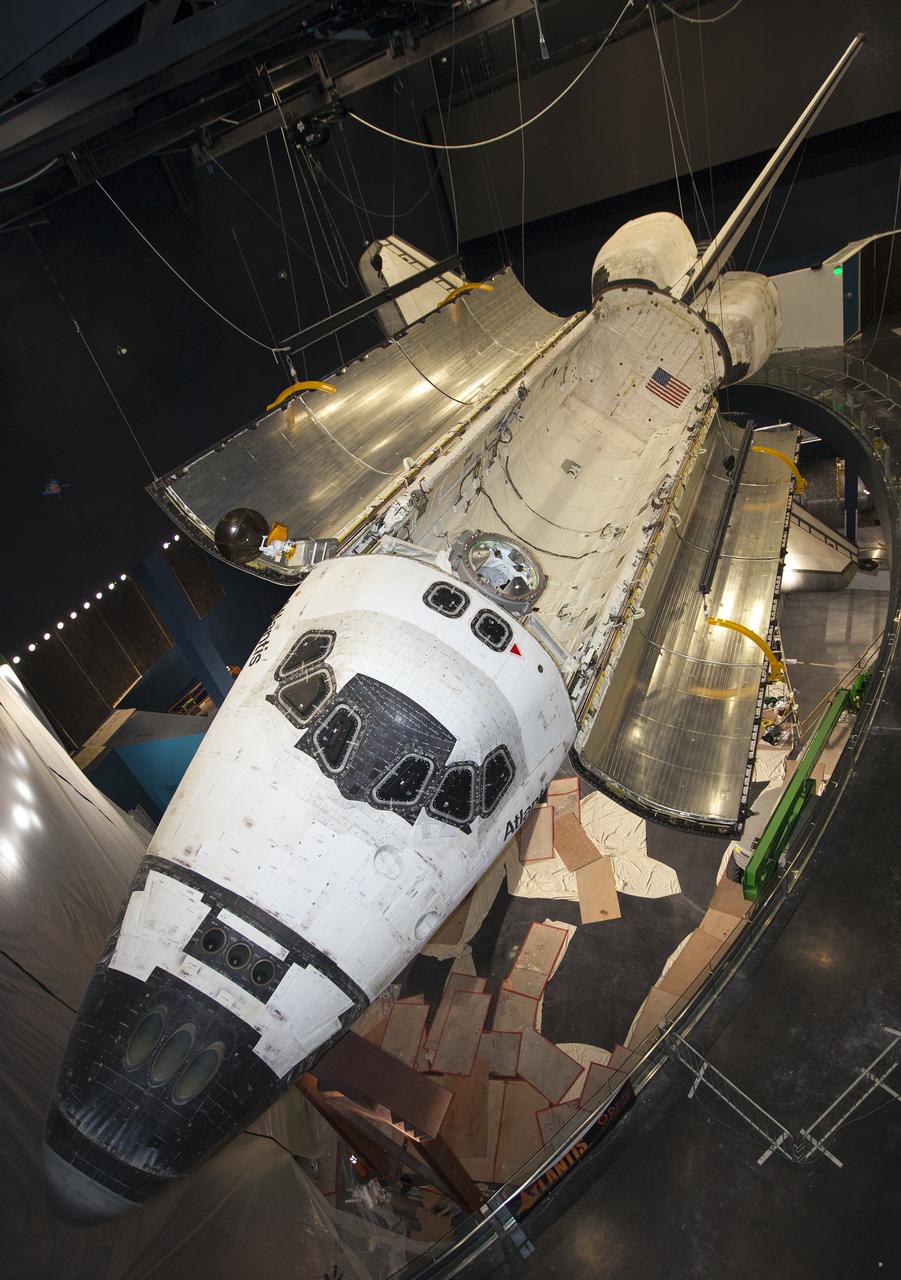 CAPE CANAVERAL, Fla. – At the Kennedy Space Center Visitor Complex in Florida, space shuttle Atlantis’ payload bay doors have been opened, revealing the payload bay. Atlantis is being prepared for display in the “Space Shuttle Atlantis” exhibit, a 90,000-square-foot facility, scheduled to open June 29, 2013.  The new $100 million facility will include interactive exhibits that tell the story of the 30-year Space Shuttle Program and highlight the future of space exploration. Visitors to the exhibit will get an up close look at Atlantis with its payload bay doors open, similar to how it looked in space. Photo credit: NASA_Kim Shiflett