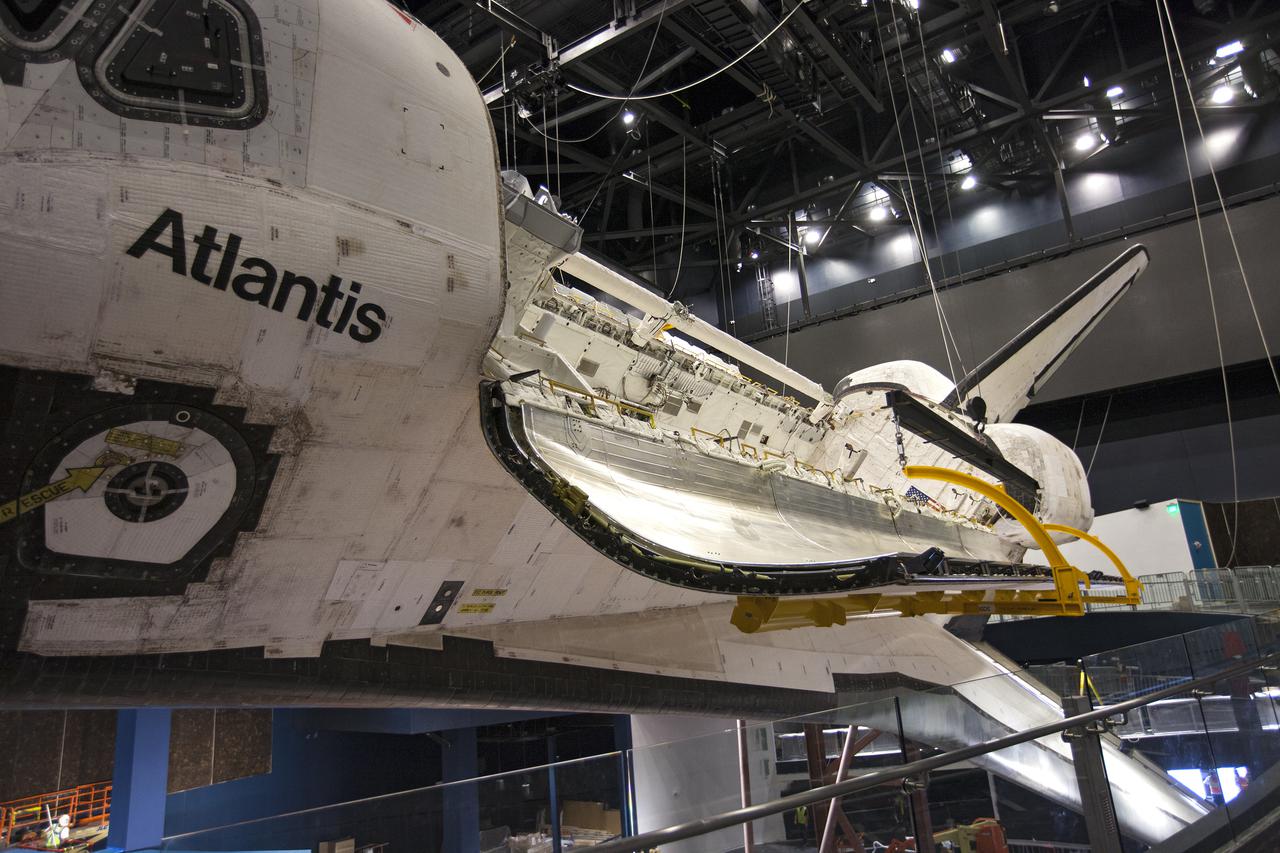 CAPE CANAVERAL, Fla. – At the Kennedy Space Center Visitor Complex in Florida, a close-up view shows space shuttle Atlantis’ payload bay doors have been opened, revealing the payload bay. Atlantis is being prepared for display in the “Space Shuttle Atlantis” exhibit, a 90,000-square-foot facility, scheduled to open June 29, 2013.  The new $100 million facility will include interactive exhibits that tell the story of the 30-year Space Shuttle Program and highlight the future of space exploration. Visitors to the exhibit will get an up close look at Atlantis with its payload bay doors open, similar to how it looked in space. Photo credit: NASA_Kim Shiflett