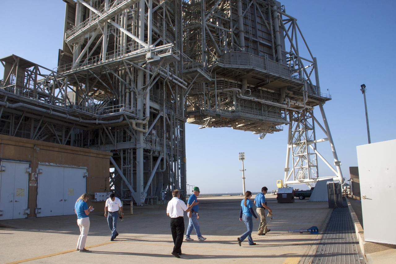 CAPE CANAVERAL, Fla. -- At NASA's Kennedy Space Center in Florida, engineers recover a small rocket following its launch as part of Rocket University. The goal was to test its systems and to verify that it performed as designed. As part of Rocket University, the engineers are given an opportunity to work a fast-track project to develop skills in developing spacecraft systems of the future. As NASA plans for future spaceflight programs to low-Earth orbit and beyond, teams of engineers at Kennedy are gaining experience in designing and flying launch vehicle systems on a small scale. Four teams of five to eight members from Kennedy are designing rockets complete with avionics and recovery systems. Launch operations require coordination with federal agencies, just as they would with rockets launched in support of a NASA mission. Photo credit: NASA_Jim Grossmann