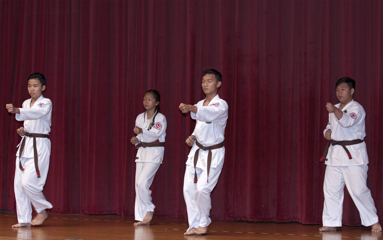 Students of the Taka Shin Kai Isshinryu Karate Dojo in Melbourne, Fla., perform karate during the Asian-Pacific American Heritage Month celebration on May 23 at the KSC Training Auditorium. The style of karate they performed is called Isshinryu Karate. The theme of the event, hosted by the Asian-Pacific American Connection APAC,  was 'Building Leadership: Embracing Cultural Values and Inclusion.'  APAC is an employee resource group at KSC. Photo credit: NASA_Kim Shiflett