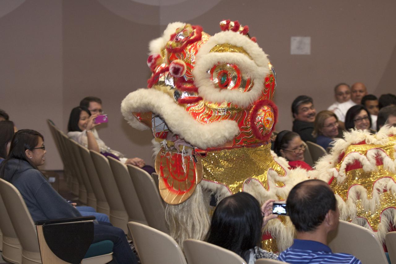 CAPE CANAVERAL, Fla. – Students of the Asian Pacific American Coalition APAC of the University of Central Florida UCF perform a lion dance during the Asian-Pacific American Heritage Month celebration on May 23 at the KSC Training Auditorium. The theme of the event, hosted by the Asian-Pacific American Connection APAC, was 'Building Leadership: Embracing Cultural Values and Inclusion.'  APAC is an employee resource group at KSC. Photo credit: NASA_Kim Shiflett
