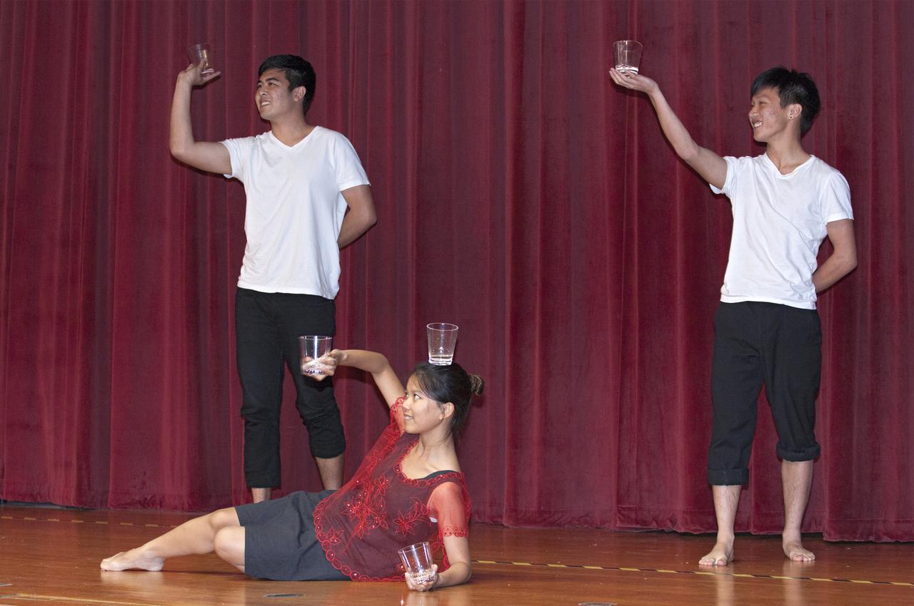 The  Filipino Student Association FSA at the University of Central Florida UCF perform a traditional Filipino cultural dance  during the Asian-Pacific American Heritage Month celebration on May 23 at the KSC Training Auditorium. The theme of the event, hosted by the Asian-Pacific American Connection APAC,  was 'Building Leadership: Embracing Cultural Values and Inclusion.'  APAC is an employee resource group at KSC. Photo credit: NASA_Kim Shiflett
