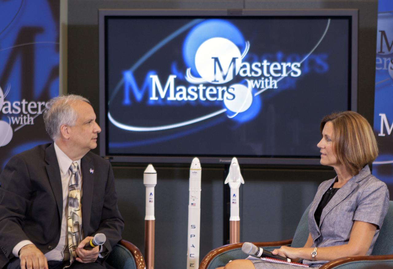 CAPE CANAVERAL, Fla. – Ed Hoffman and Lisa Colloredo discuss NASA's Commercial Crew Program during the first of a weeklong series called 'Masters with Masters' at the agency's Kennedy Space Center in Florida. Hoffman, NASA's chief Knowledge officer, and Colloredo, associate program manager at Kennedy, were joined by phone by Ed Mango, program manager for CCP. Photo credit: NASA_Jim Grossmann