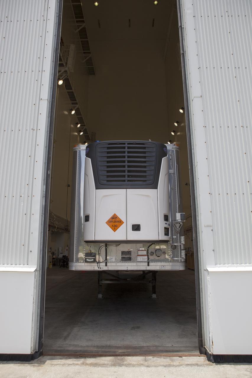 CAPE CANAVERAL, Fla. – At NASA’s Kennedy Space Center in Florida, a truck arrives at the Launch Abort System Facility with the jettison motor from Aerojet in Redmond, Wash. The motor is part of the Launch Abort System, or LAS, for Exploration Flight Test 1, or EFT-1, of the agency’s Orion Multi-Purpose Crew Vehicle. The motor will jettison the LAS away from the Orion crew capsule during the flight test’s early ascent phase. Orion’s Launch Abort System is designed to safely pull the Orion crew module away from the launch vehicle in the event of an emergency on the launch pad or during the initial ascent of NASA’s Space Launch System, or SLS, rocket.  Orion is the exploration spacecraft designed to carry crews to space beyond low Earth orbit. It will provide emergency abort capability, sustain the crew during the space travel and provide safe re-entry from deep space return velocities. Orion’s first unpiloted test flight is scheduled to launch in 2014 atop a Delta IV rocket. A second uncrewed flight test is scheduled for 2017 on the SLS rocket. For more information, visit http:__www.nasa.gov_orion. Photo credit: NASA_Dimitri Gerondidakis