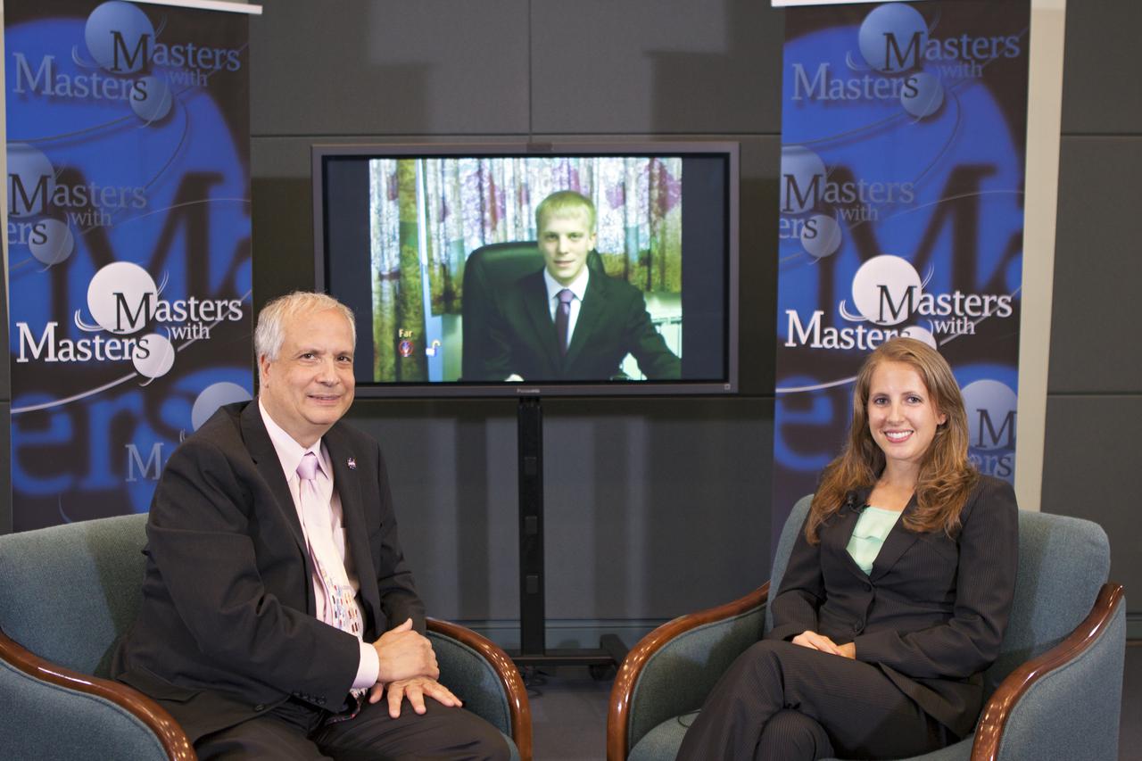 CAPE CANAVERAL, Fla. – At NASA's Kennedy Space Center in Florida, Ed Hoffman and Annie Caraccio discuss the 'Young Professional's Perspective at NASA' during the final day of a weeklong series called 'Masters with Masters.' Hoffman, NASA's chief Knowledge officer, and Caraccio, a chemical engineer in the Engineering and Technology Directorate at Kennedy, were joined by Philip Harris, an International Operations engineer from the Johnson Space Center via a television link with NASA's office in Moscow. Photo credit: NASA_Jim Grossmann