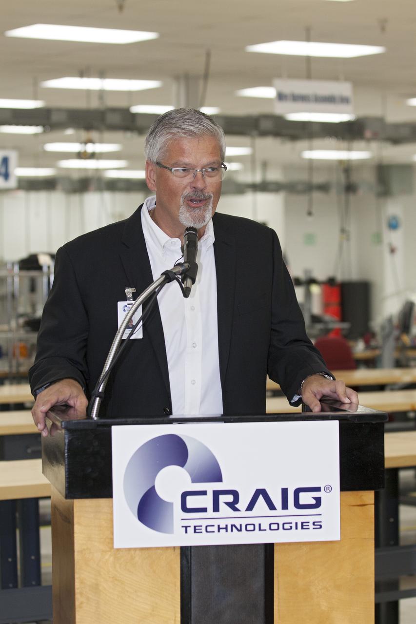 CAPE CANAVERAL, Fla. – At the Aerospace and Defense Manufacturing Center in Cape Canaveral, Fla., Craig Technologies President Mark Mikolajczyk speaks to guests during a community open house at the 161,000-square-foot facility.   In June of last year, NASA signed a partnership agreement with Craig Technologies to maintain an inventory of unique processing and manufacturing equipment for future mission support at the agency's Kennedy Space Center. The Cape Canaveral, Fla., facility, formerly known as the NASA Shuttle Logistics Depot NSLD, is now the Aerospace and Defense Manufacturing Center ADMC. Photo credit: NASA_Kim Shiflett