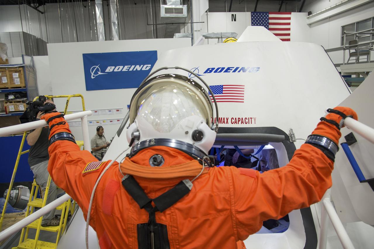 Crew Commercial Office's PAO activities for Boeing's rollout of their CST-100 capsule - "First Look" Media Event.  Photo Date: July 22, 2013.  Location: Boeing - Houston Product Support Center.  Photographer: Robert Markowitz