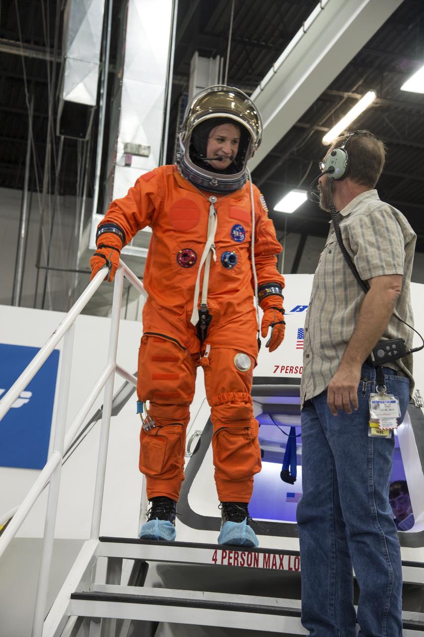 Crew Commercial Office's PAO activities for Boeing's rollout of their CST-100 capsule - "First Look" Media Event.  Photo Date: July 22, 2013.  Location: Boeing - Houston Product Support Center.  Photographer: Robert Markowitz