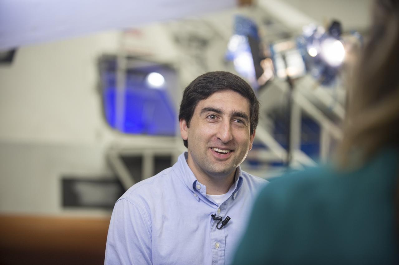 Crew Commercial Office's PAO activities for Boeing's rollout of their CST-100 capsule - "First Look" Media Event.  Photo Date: July 23, 2013.  Location: Boeing - Houston Product Support Center.  Photographer: Robert Markowitz