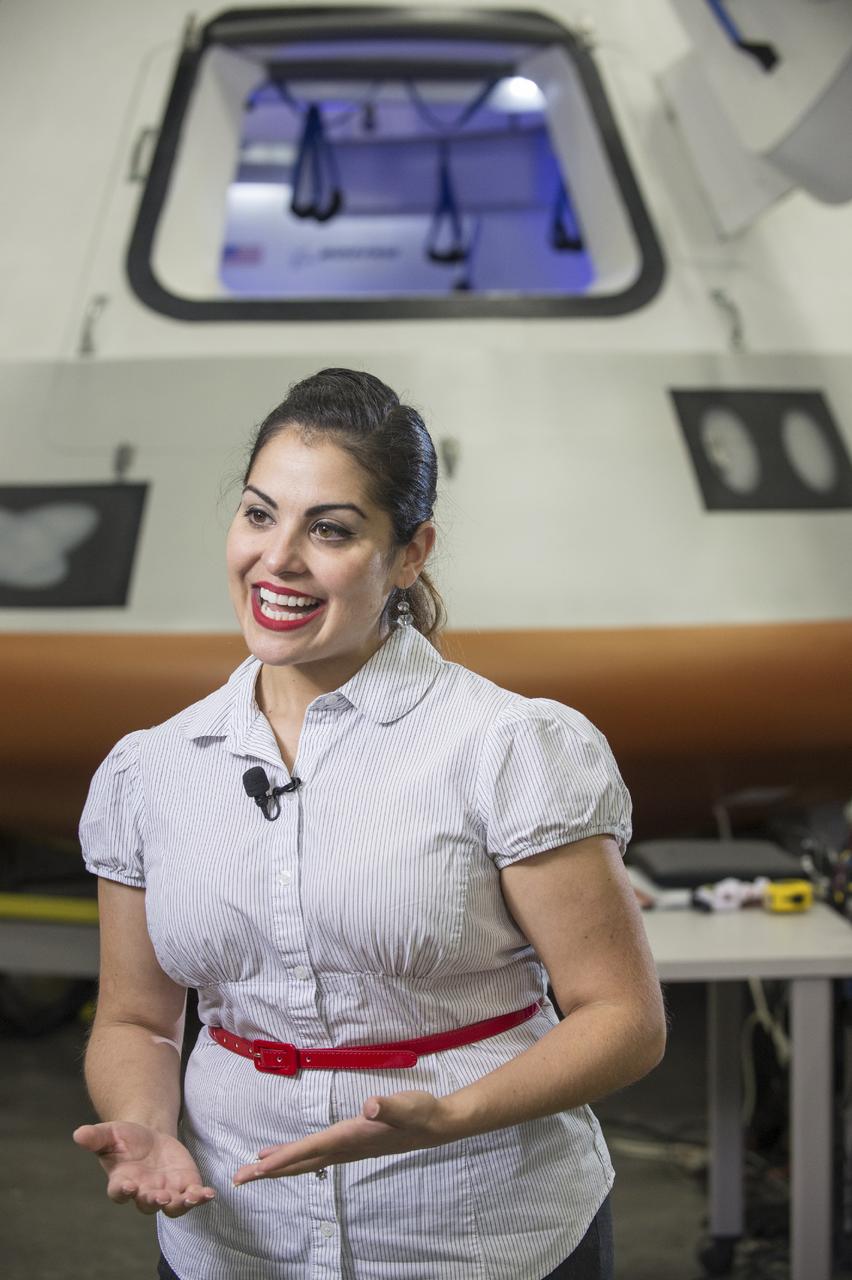 Crew Commercial Office's PAO activities for Boeing's rollout of their CST-100 capsule - "First Look" Media Event.  Photo Date: July 23, 2013.  Location: Boeing - Houston Product Support Center.  Photographer: Robert Markowitz