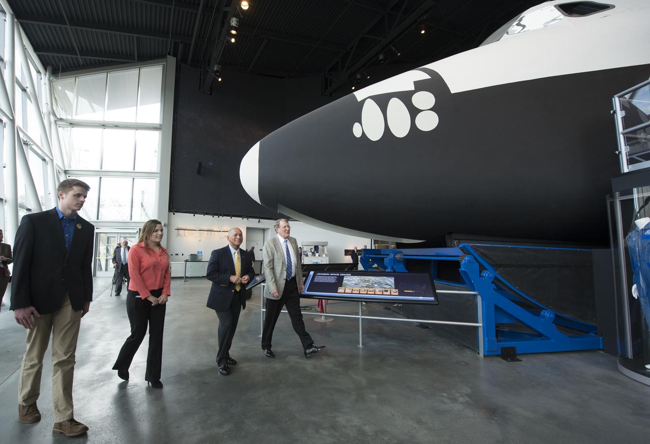 NASA Administrator Charles Bolden, third from left, is seen as he is escorted on a tour of the Space Shuttle Trainer Crew Compartment in the Charles Simonyi Space Gallery at the Museum of Flight, Tuesday, Jan. 15, 2013 in Seattle, Washington.  Bolden is joined by Washington Aerospace Scholars Alec Lindsey, far left, Brenna Tuller-Ross and Doug King, far right, president and CEO of the museum.  Photo Credit: (NASA/Carla Cioffi)