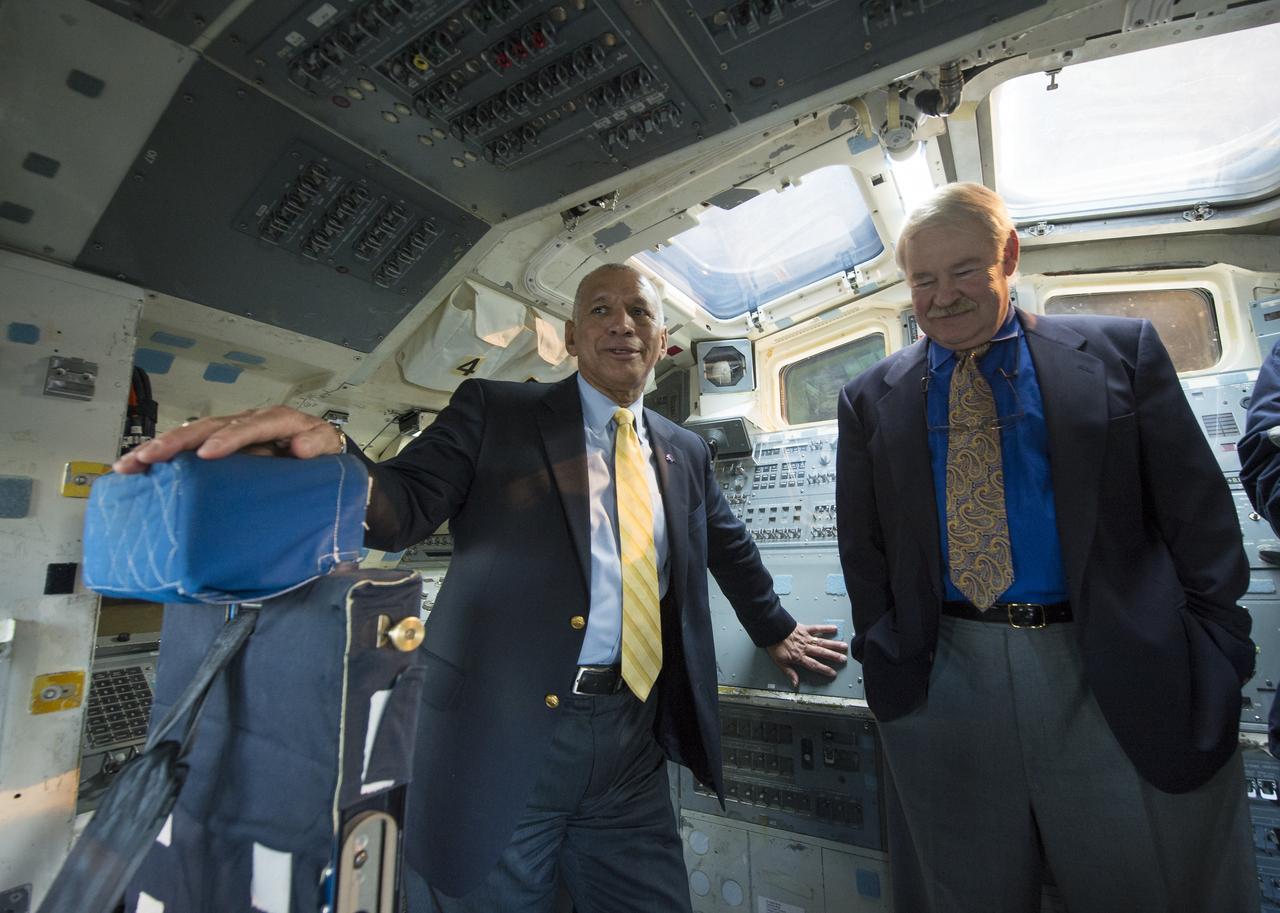 NASA Administrator Charles Bolden, left, is seen with former NASA astronaut John Creighton in the Space Shuttle Trainer Crew Compartment in the Charles Simonyi Space Gallery while on a tour at the Museum of Flight on Tuesday, Jan. 15, 2013 in Seattle, Washington. Photo Credit: (NASA/Carla Cioffi)