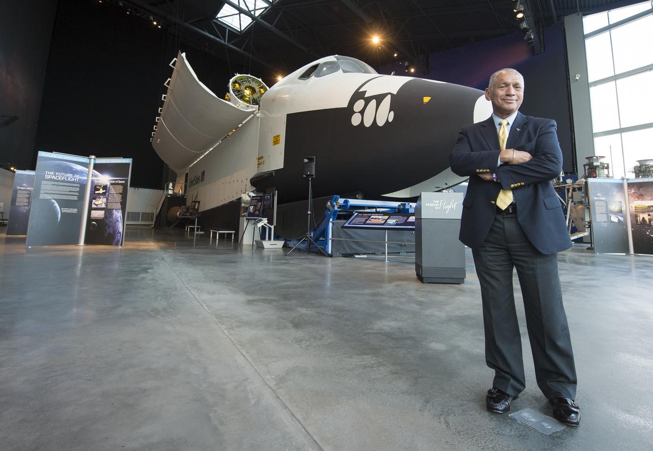 NASA Administrator Charles Bolden poses in front of the Space Shuttle Trainer Crew Compartment in the Charles Simonyi Space Gallery while on a tour at the Museum of Flight on Tuesday, Jan. 15, 2013 in Seattle, Washington. Photo Credit: (NASA/Carla Cioffi)