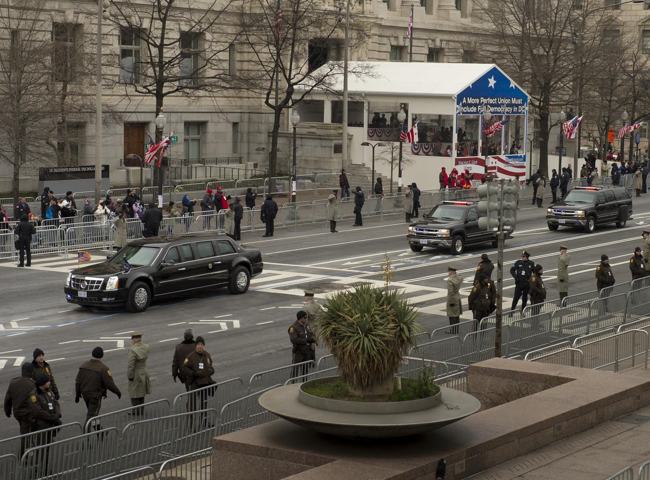 The presidential limousine is seen traveling up Pennsylvania Avenue soon after President Barack Obama departed the White House for Capitol Hill and the swearing-in of Obama as the nation's 44th President, Monday, Jan. 21, 2013, in Washington. Photo Credit: (NASA/Carla Cioffi)