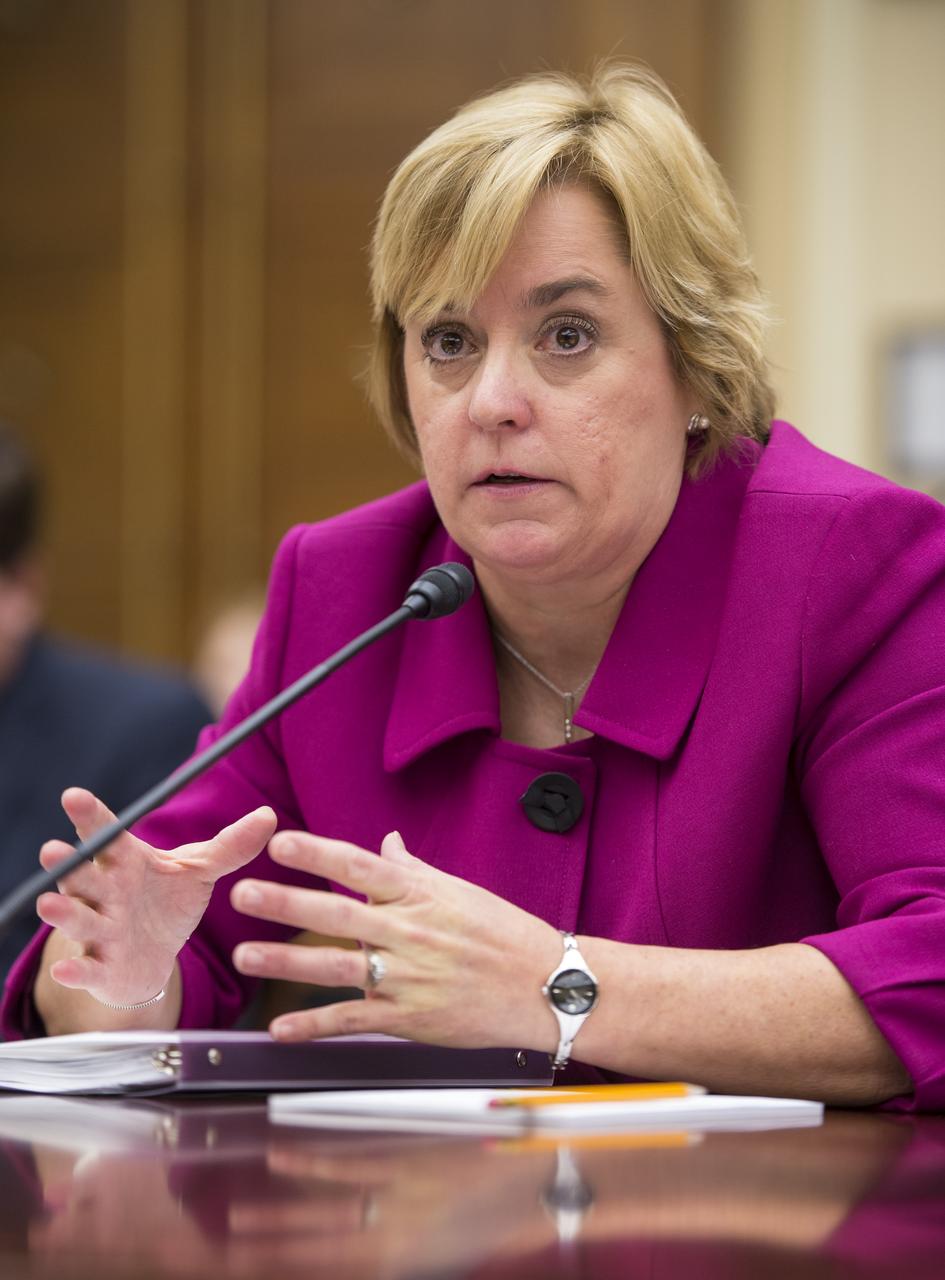 Dr. Karlin Toner, Director, Joint Planning and Development Office, Federal Aviation Administration (FAA), talks during a House Subcommittee on Oversight hearing titled "Operating Unmanned Aircraft Systems in the National Airspace System: Assessing Research and Development Efforts to Ensure Safety" on Friday, Feb. 15, 2013 at the Rayburn House Office Building in Washington.  Photo Credit: (NASA/Bill Ingalls)
