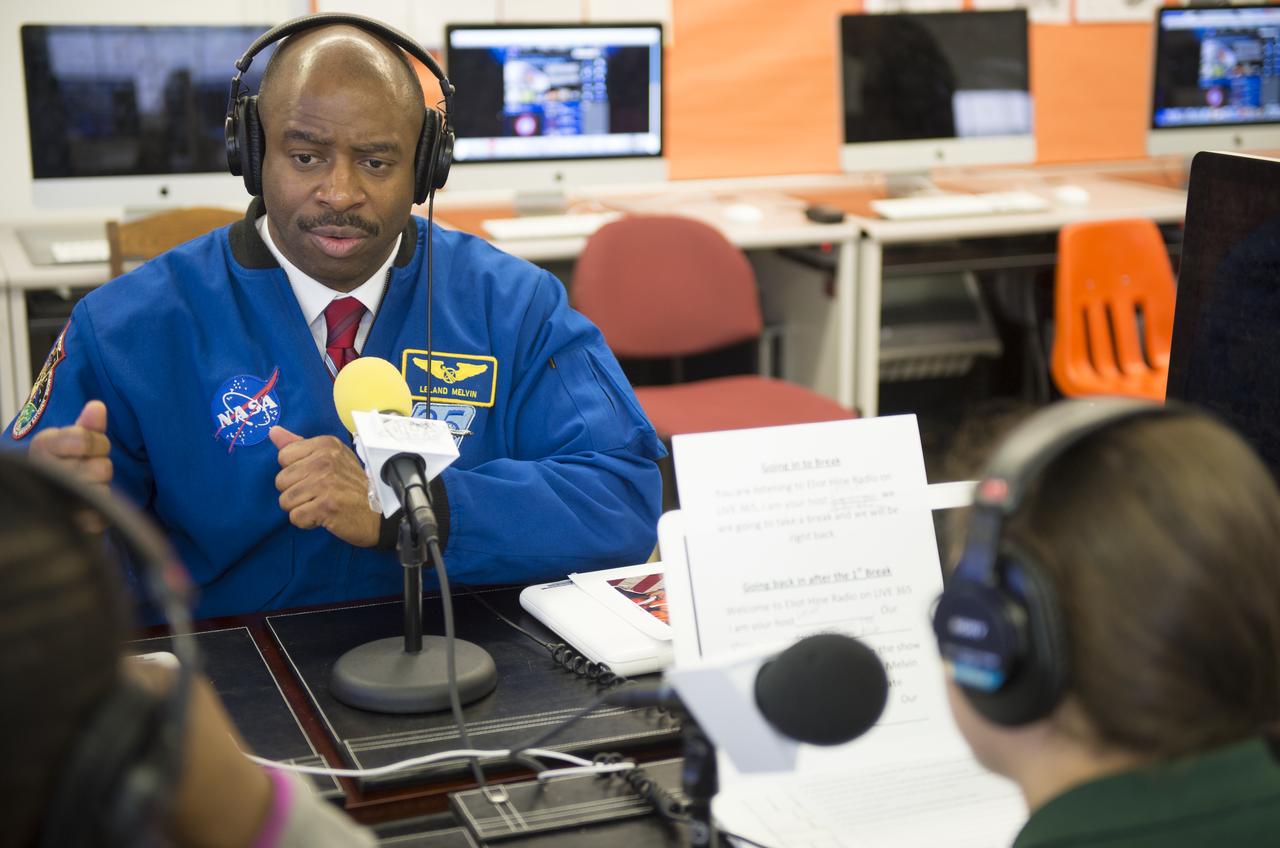 Leland Melvin, NASA Associate Administrator for Education and former astronaut, is interviewed by sixth grade students from the Broadcast Media Class at Eliot Hine Middle School on Friday, March 1, 2013 in Washington.  The radio club program, Eliot Hine Radio, is broadcast live on the internet.  Photo Credit: (NASA/Carla Cioffi)