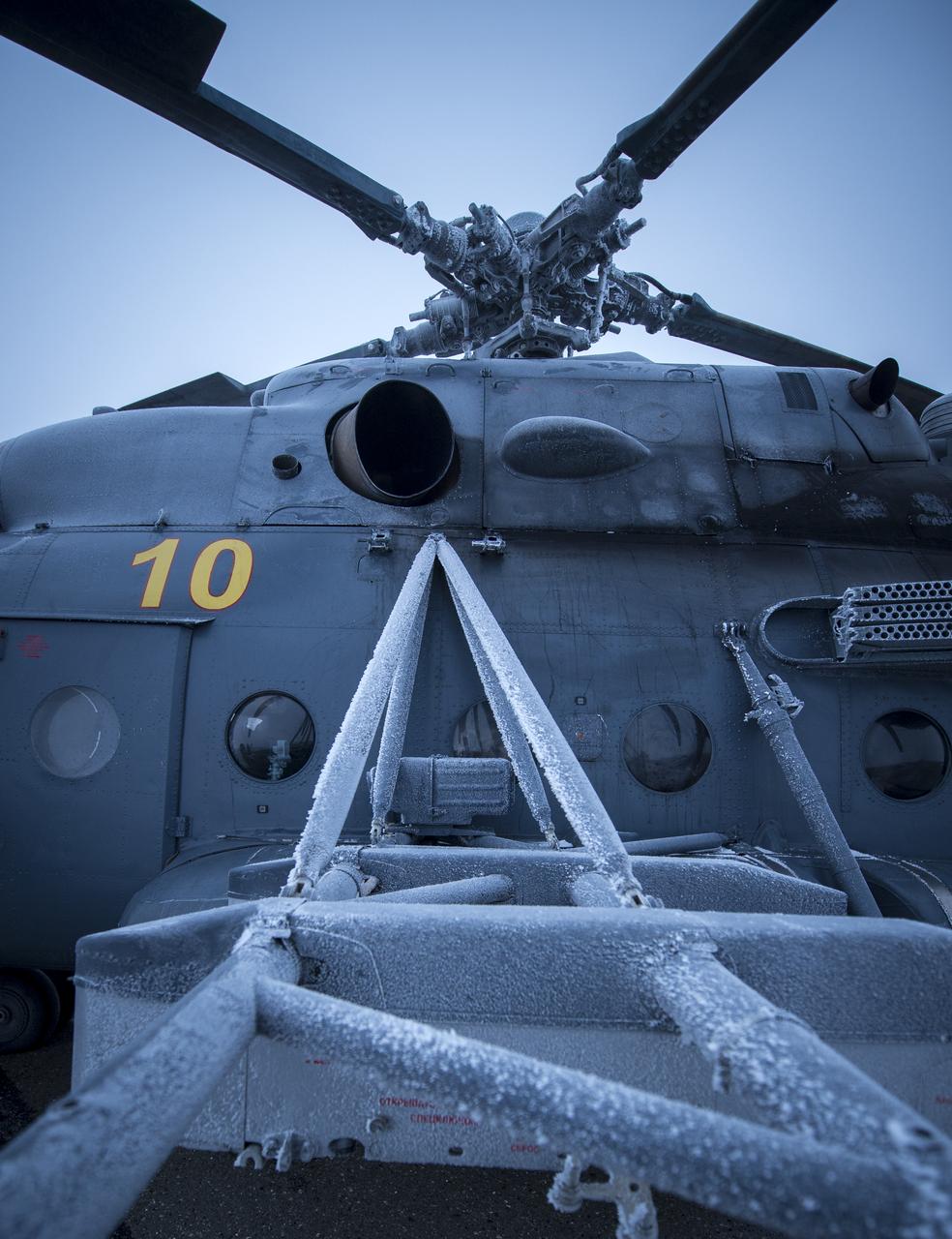 A view of a Russian Search and Rescue helicopter that was grounded by low visibility at the Arkalyk Airport in Kazakhstan on Saturday, March 16, 2013. The Soyuz TMA-06M spacecraft landed with Expedition 34 Commander Kevin Ford of NASA, Russian Soyuz Commander Oleg Novitskiy and Russian Flight Engineer Evgeny Tarelkin near the town of Arkalyk, Kazakhstan on Saturday, March 16, 2013. Ford, Novitskiy, and Tarelkin returned from 142 days onboard the International Space Station where they served as members of the Expedition 33 and 34 crews. Photo Credit: (NASA/Bill Ingalls)