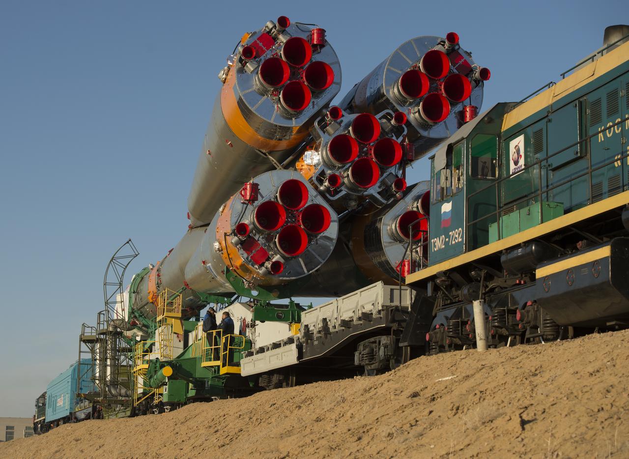 The Soyuz rocket is rolled out to the launch pad by train on Tuesday, March 26, 2013, at the Baikonur Cosmodrome in Kazakhstan. Launch of the Soyuz rocket is scheduled for March 29 and will send Expedition 35 Soyuz Commander Pavel Vinogradov, and Flight Engineers Chris Cassidy of NASA and Alexander Misurkin of Russia on a five and a half-month mission aboard the International Space Station. Photo Credit: (NASA/Carla Cioffi)