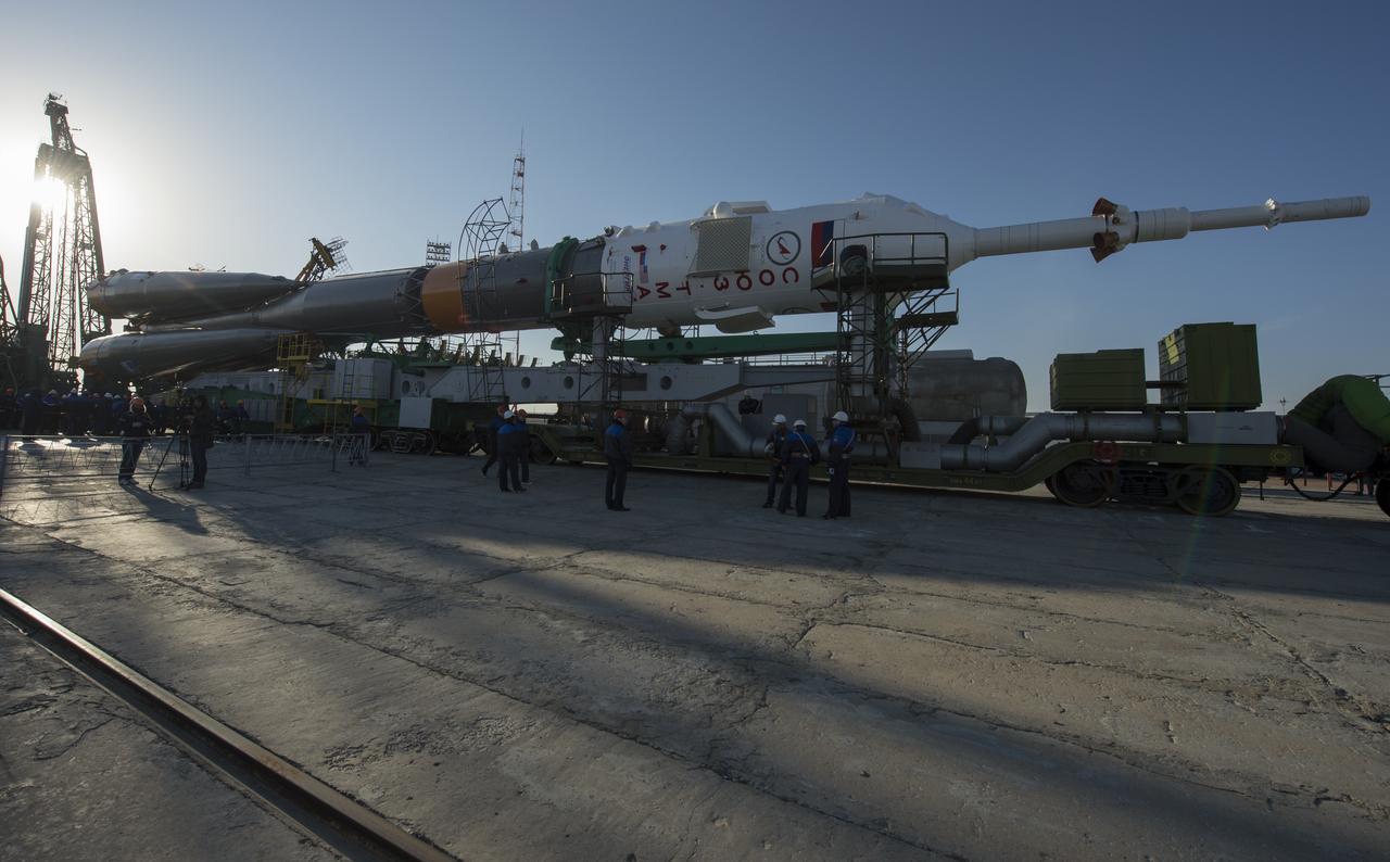 The Soyuz rocket arrives at its launch pad by train on Tuesday, March 26, 2013, at the Baikonur Cosmodrome in Kazakhstan. Launch of the Soyuz rocket is scheduled for March 29 and will send Expedition 35 Soyuz Commander Pavel Vinogradov, and Flight Engineers Chris Cassidy of NASA and Alexander Misurkin of Russia on a five and a half-month mission aboard the International Space Station. Photo Credit: (NASA/Carla Cioffi)