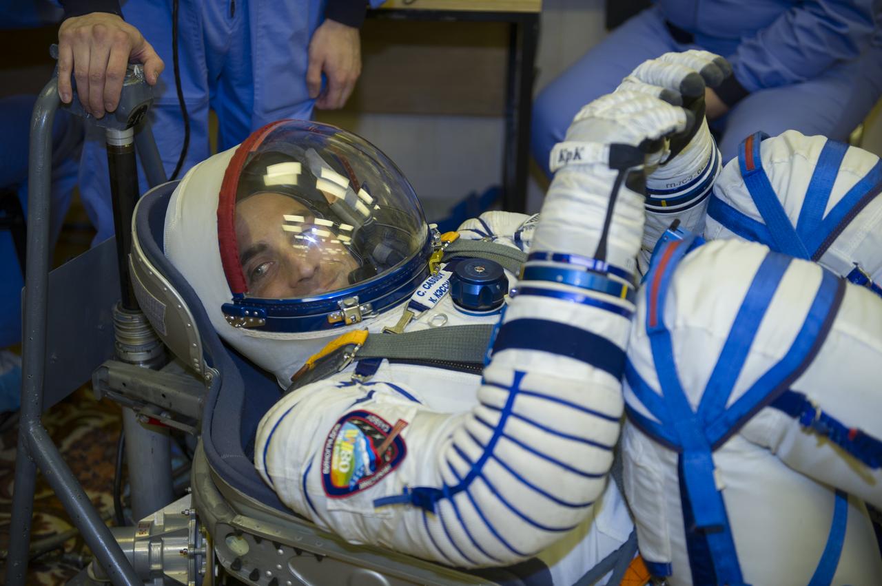 Expedition 35 NASA Flight Engineer Chris Cassidy has his Russian Sokol suit pressure checked ahead of his launch onboard a Soyuz TMA-08M spacecraft to the International Space Station, Thursday, March 28, 2013, at the Baikonur Cosmodrome in Kazakhstan. Launch of the Soyuz rocket will send Cassidy, Soyuz Commander Pavel Vinogradov and Russian Flight Engineer Alexander Misurkin on a five and a half-month mission aboard the International Space Station. Photo Credit: (NASA/GCTC/Irina Peshkova)