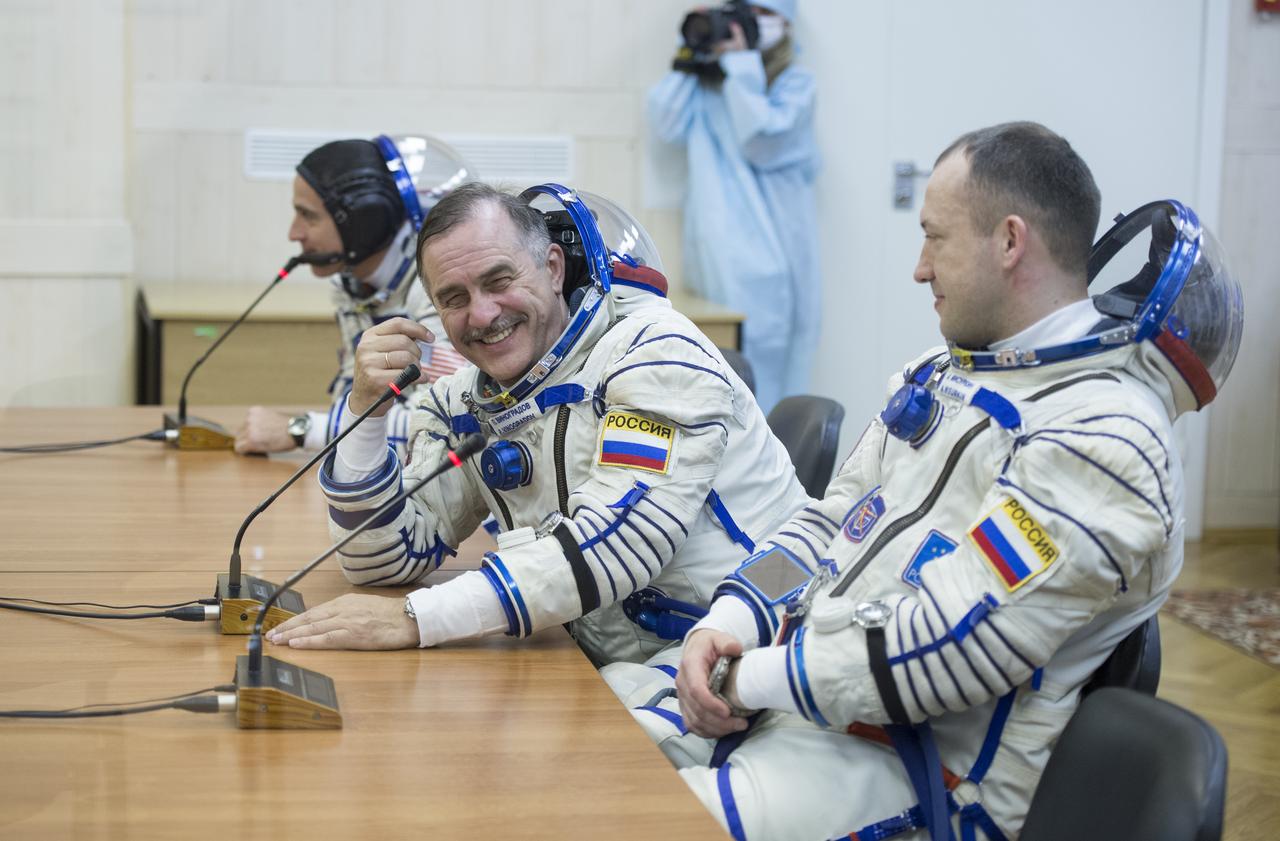 Expedition 35 Soyuz Commander Pavel Vinogradov and Russian Flight Engineer Alexander Misurkin share a laugh after having their Sokol suits pressure checked, Thursday, March 28, 2013, at the Baikonur Cosmodrome in Kazakhstan. Launch of the Soyuz rocket will send Vinogradov, Misurkin and NASA Flight Engineer Chris Cassidy on a five and a half-month mission aboard the International Space Station. Photo Credit: (NASA/Carla Cioffi)