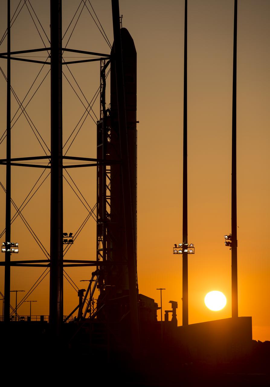 The Orbital Sciences Corporation Antares rocket is seen during sunrise on the Mid-Atlantic Regional Spaceport (MARS) Pad-0A at the NASA Wallops Flight Facility in Virginia, Sunday, April 21, 2013.  NASA's commercial space partner, Orbital Sciences Corporation, is scheduled to test launch its first Antares later in the day.  Photo Credit: (NASA/Bill Ingalls)
