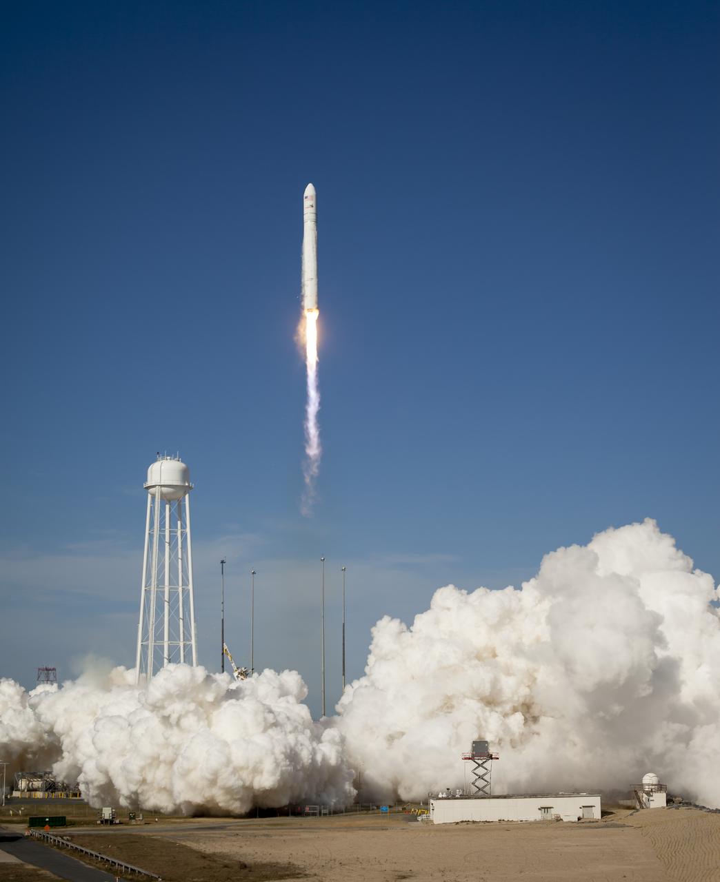 The Orbital Sciences Corporation Antares rocket is seen as it launches from Pad-0A of the Mid-Atlantic Regional Spaceport (MARS) at the NASA Wallops Flight Facility in Virginia, Sunday, April 21, 2013. The test launch marked the first flight of Antares and the first rocket launch from Pad-0A. The Antares rocket delivered the equivalent mass of a spacecraft, a so-called mass simulated payload, into Earth's orbit. Photo Credit: (NASA/Bill Ingalls)
