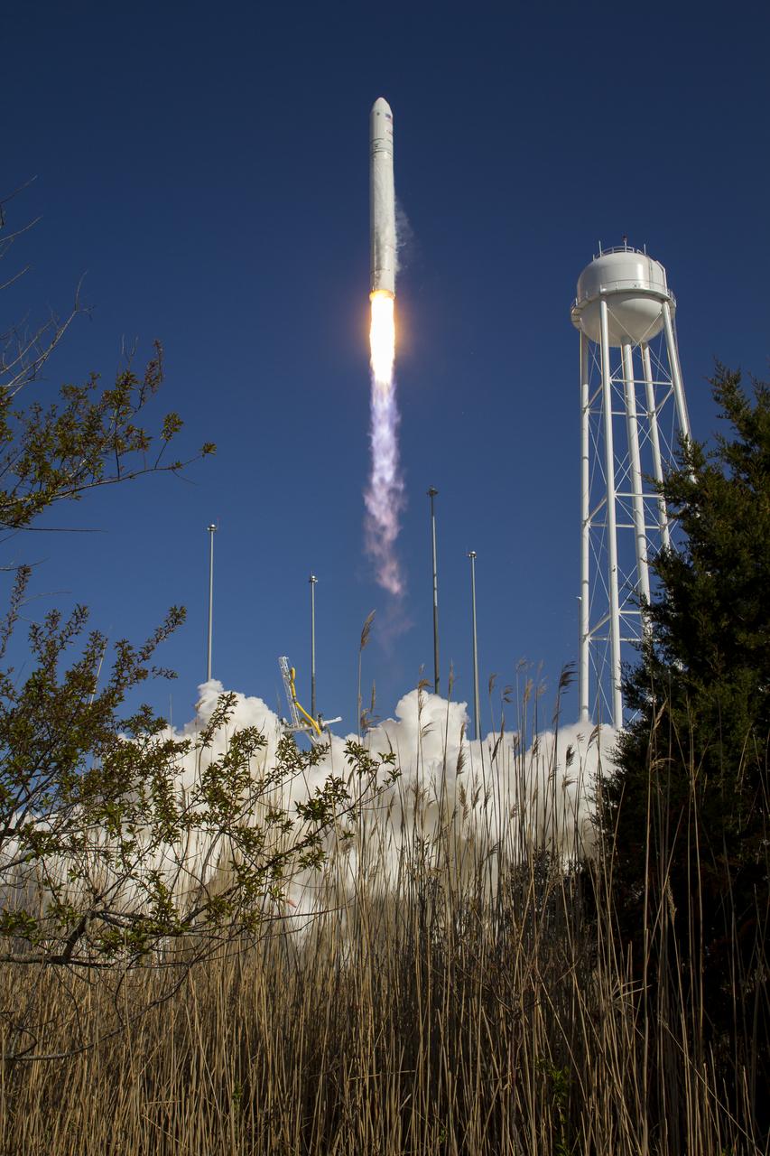 The Orbital Sciences Corporation Antares rocket is seen as it launches from Pad-0A of the Mid-Atlantic Regional Spaceport (MARS) at the NASA Wallops Flight Facility in Virginia, Sunday, April 21, 2013. The test launch marked the first flight of Antares and the first rocket launch from Pad-0A. The Antares rocket delivered the equivalent mass of a spacecraft, a so-called mass simulated payload, into Earth's orbit. Photo Credit: (NASA/Bill Ingalls)