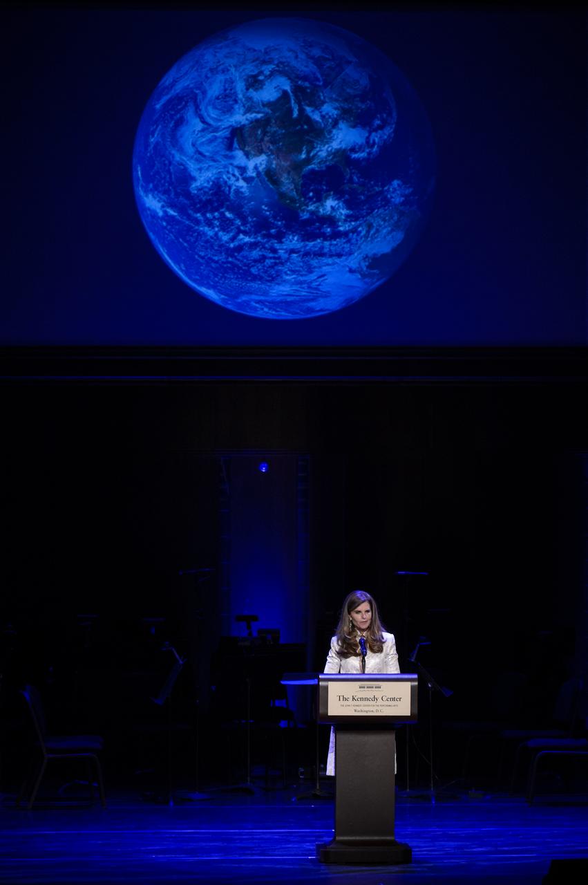 Journalist and former First Lady of California Maria Shriver reads the poem "The Summer Day" by Mary Oliver during the National Tribute to Sally Ride at the John F. Kennedy Center for the Performing Arts, Monday, May 20, 2013 in Washington. Photo Credit: (NASA/Bill Ingalls)
