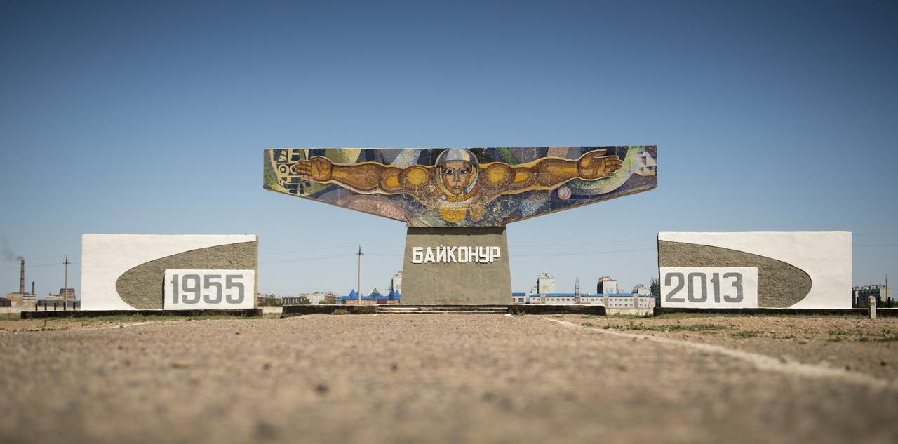 A space themed mural made of tile is seen at the entrance to the town of Baikonur, Kazakhstan on Saturday, May 25, 2013.  Launch of a Soyuz rocket to the International Space Station (ISS) with Expedition 36/37 Soyuz Commander Fyodor Yurchikhin of the Russian Federal Space Agency (Roscosmos), Flight Engineers; Luca Parmitano of the European Space Agency, and Karen Nyberg of NASA, is scheduled for Wednesday May 29, Kazakh time. Yurchikhin, Nyberg, and, Parmitano, will remain aboard the station until mid-November. Photo Credit: (NASA/Bill Ingalls)