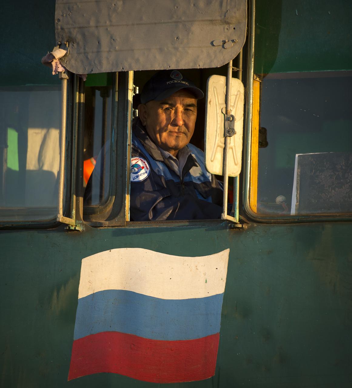 A locomotive conductor prepares to move the Soyuz TMA-09M spacecraft out by train to the Baikonur Cosmodrome launch pad, Sunday, May 26, 2013, in Kazakhstan.  The launch of the Soyuz rocket to the International Space Station (ISS) with Expedition 36/37 Soyuz Commander Fyodor Yurchikhin of the Russian Federal Space Agency (Roscosmos), Flight Engineers; Luca Parmitano of the European Space Agency, and Karen Nyberg of NASA, is scheduled for Wednesday May 29, Kazakh time. Yurchikhin, Nyberg, and, Parmitano, will remain aboard the station until mid-November. Photo credit: (NASA/Bill Ingalls)