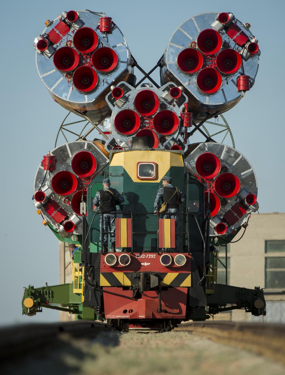 The Soyuz TMA-09M spacecraft is rolled out by train to the Baikonur Cosmodrome launch pad, Sunday, May 26, 2013, in Kazakhstan.  The launch of the Soyuz rocket to the International Space Station (ISS) with Expedition 36/37 Soyuz Commander Fyodor Yurchikhin of the Russian Federal Space Agency (Roscosmos), Flight Engineers; Luca Parmitano of the European Space Agency, and Karen Nyberg of NASA, is scheduled for Wednesday May 29, Kazakh time. Yurchikhin, Nyberg, and, Parmitano, will remain aboard the station until mid-November. Photo credit: (NASA/Bill Ingalls)