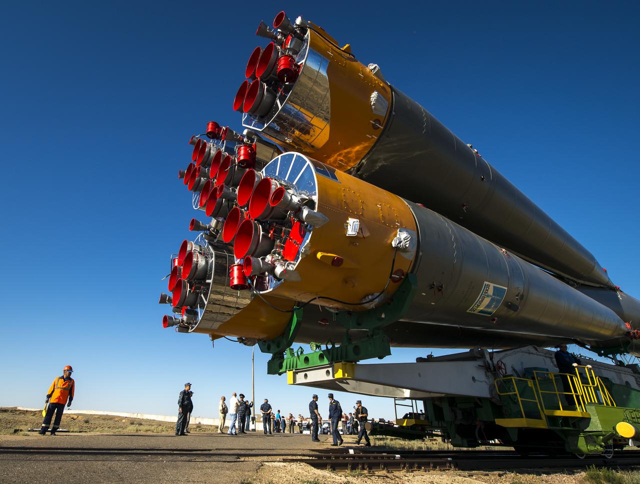 The Soyuz TMA-09M spacecraft is rolled out by train to the Baikonur Cosmodrome launch pad, Sunday, May 26, 2013, in Kazakhstan.  The launch of the Soyuz rocket to the International Space Station (ISS) with Expedition 36/37 Soyuz Commander Fyodor Yurchikhin of the Russian Federal Space Agency (Roscosmos), Flight Engineers; Luca Parmitano of the European Space Agency, and Karen Nyberg of NASA, is scheduled for Wednesday May 29, Kazakh time. Yurchikhin, Nyberg, and, Parmitano, will remain aboard the station until mid-November. Photo credit: (NASA/Bill Ingalls)