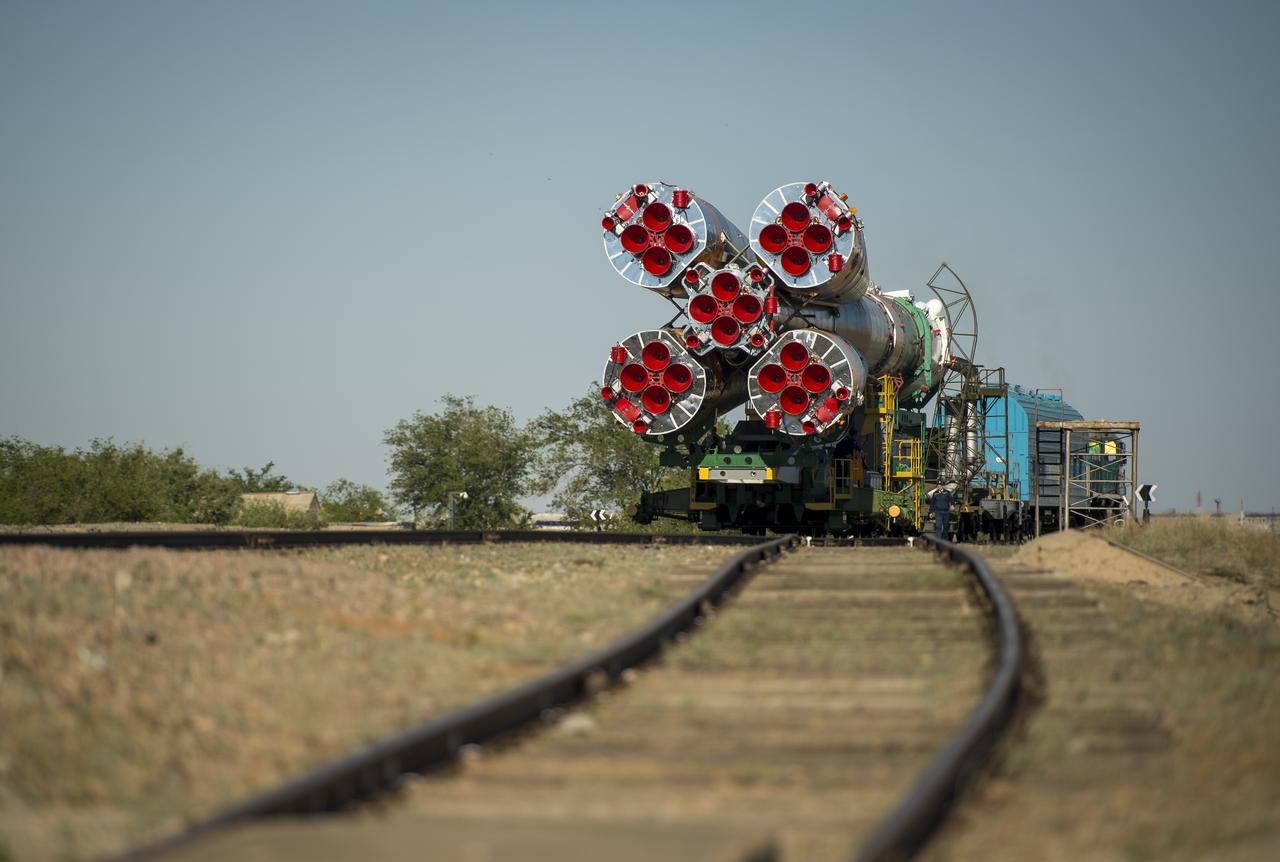 The Soyuz TMA-09M spacecraft is rolled out by train to the Baikonur Cosmodrome launch pad, Sunday, May 26, 2013, in Kazakhstan.  The launch of the Soyuz rocket to the International Space Station (ISS) with Expedition 36/37 Soyuz Commander Fyodor Yurchikhin of the Russian Federal Space Agency (Roscosmos), Flight Engineers; Luca Parmitano of the European Space Agency, and Karen Nyberg of NASA, is scheduled for Wednesday May 29, Kazakh time. Yurchikhin, Nyberg, and, Parmitano, will remain aboard the station until mid-November. Photo credit: (NASA/Bill Ingalls)