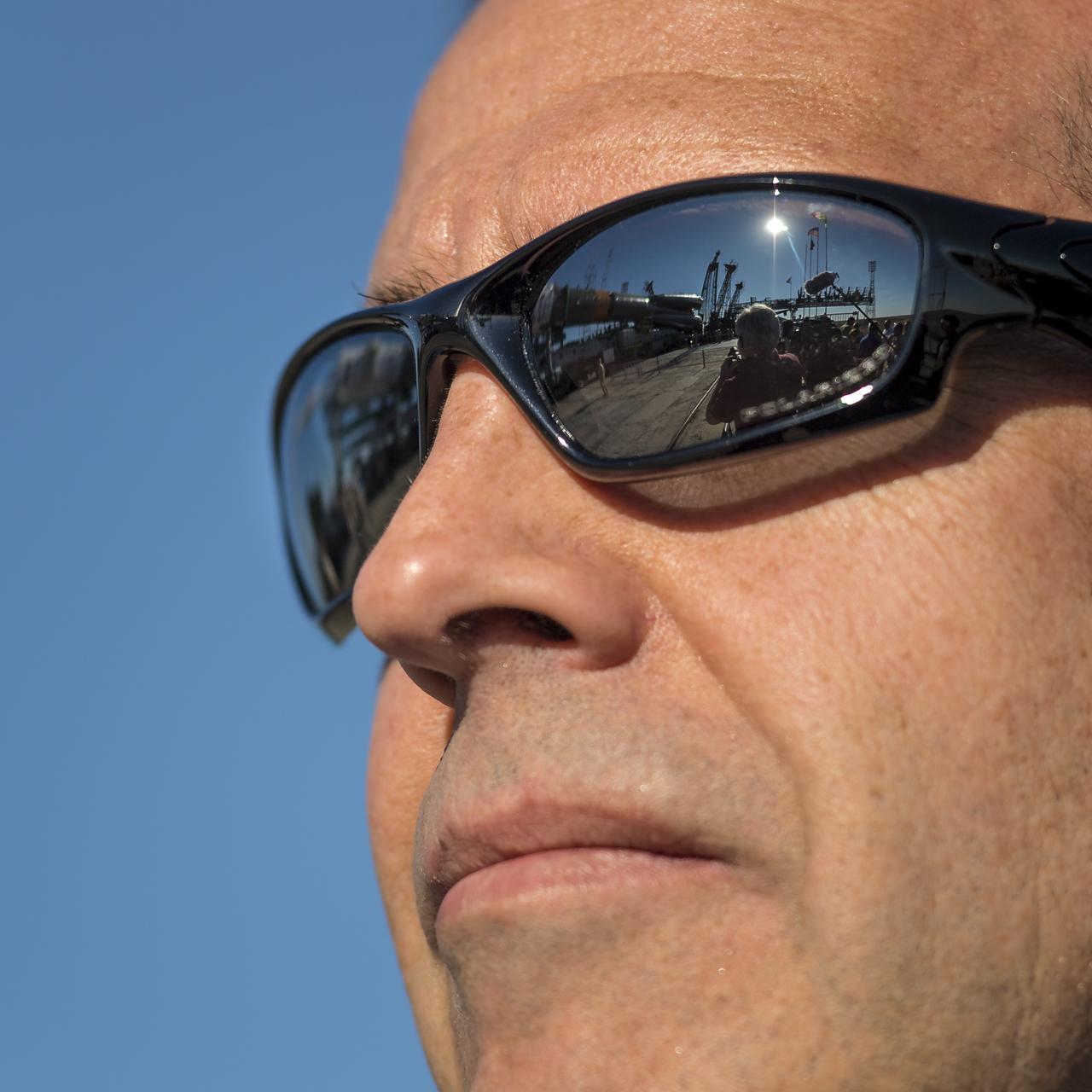 The Soyuz TMA-09M spacecraft is seen reflected in the glasses of Expedition 36 backup Flight Engineer Rick Mastracchio of NASA at the Baikonur Cosmodrome launch pad, Sunday, May 26, 2013, in Kazakhstan.  The launch of the Soyuz rocket to the International Space Station (ISS) with Expedition 36/37 Soyuz Commander Fyodor Yurchikhin of the Russian Federal Space Agency (Roscosmos), Flight Engineers; Luca Parmitano of the European Space Agency, and Karen Nyberg of NASA, is scheduled for Wednesday May 29, Kazakh time. Yurchikhin, Nyberg, and, Parmitano, will remain aboard the station until mid-November. Photo credit: (NASA/Bill Ingalls)