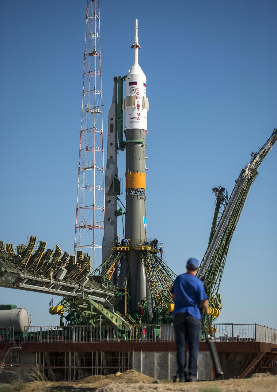 The Soyuz TMA-09M spacecraft is seen after arriving at the Baikonur Cosmodrome launch pad by train, Sunday, May 26, 2013, in Kazakhstan.  The launch of the Soyuz rocket to the International Space Station (ISS) with Expedition 36/37 Soyuz Commander Fyodor Yurchikhin of the Russian Federal Space Agency (Roscosmos), Flight Engineers; Luca Parmitano of the European Space Agency, and Karen Nyberg of NASA, is scheduled for Wednesday May 29, Kazakh time. Yurchikhin, Nyberg, and, Parmitano, will remain aboard the station until mid-November. Photo credit: (NASA/Bill Ingalls)
