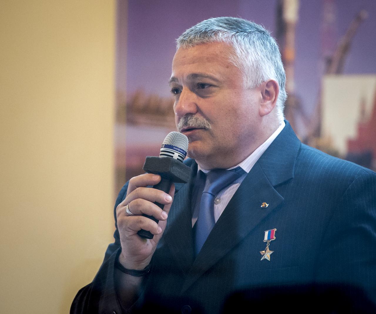 Expedition 36/37 Soyuz Commander Fyodor Yurchikhin of the Russian Federal Space Agency (Roscosmos) talks during the State Commission meeting at the Cosmonaut Hotel, Monday, May 27, 2013, in Kazakhstan. Yurichikin and his fellow crew members, Flight Engineers; Karen Nyberg of NASA, and Luca Parmitano of the European Space Agency, were in quarantine and kept behind glass during the meeting in preparation for their launch on a Soyuz rocket to the International Space Station (ISS) on Wednesday May 29, Kazakh time. Photo credit: (NASA/Bill Ingalls)