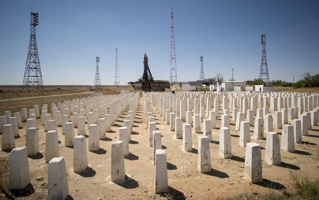 The Soyuz rocket is seen in the background at the Baikonur Cosmodrome launch pad, Tuesday, May 28, 2013, in Kazakhstan.  The launch of the Soyuz rocket to the International Space Station (ISS) with Expedition 36/37 Soyuz Commander Fyodor Yurchikhin of the Russian Federal Space Agency (Roscosmos), Flight Engineers; Luca Parmitano of the European Space Agency, and Karen Nyberg of NASA, is scheduled for 2:31a.m., Wednesday May 29, Kazakh time. Yurchikhin, Nyberg, and, Parmitano, will remain aboard the station until mid-November. Photo credit: (NASA/Bill Ingalls)